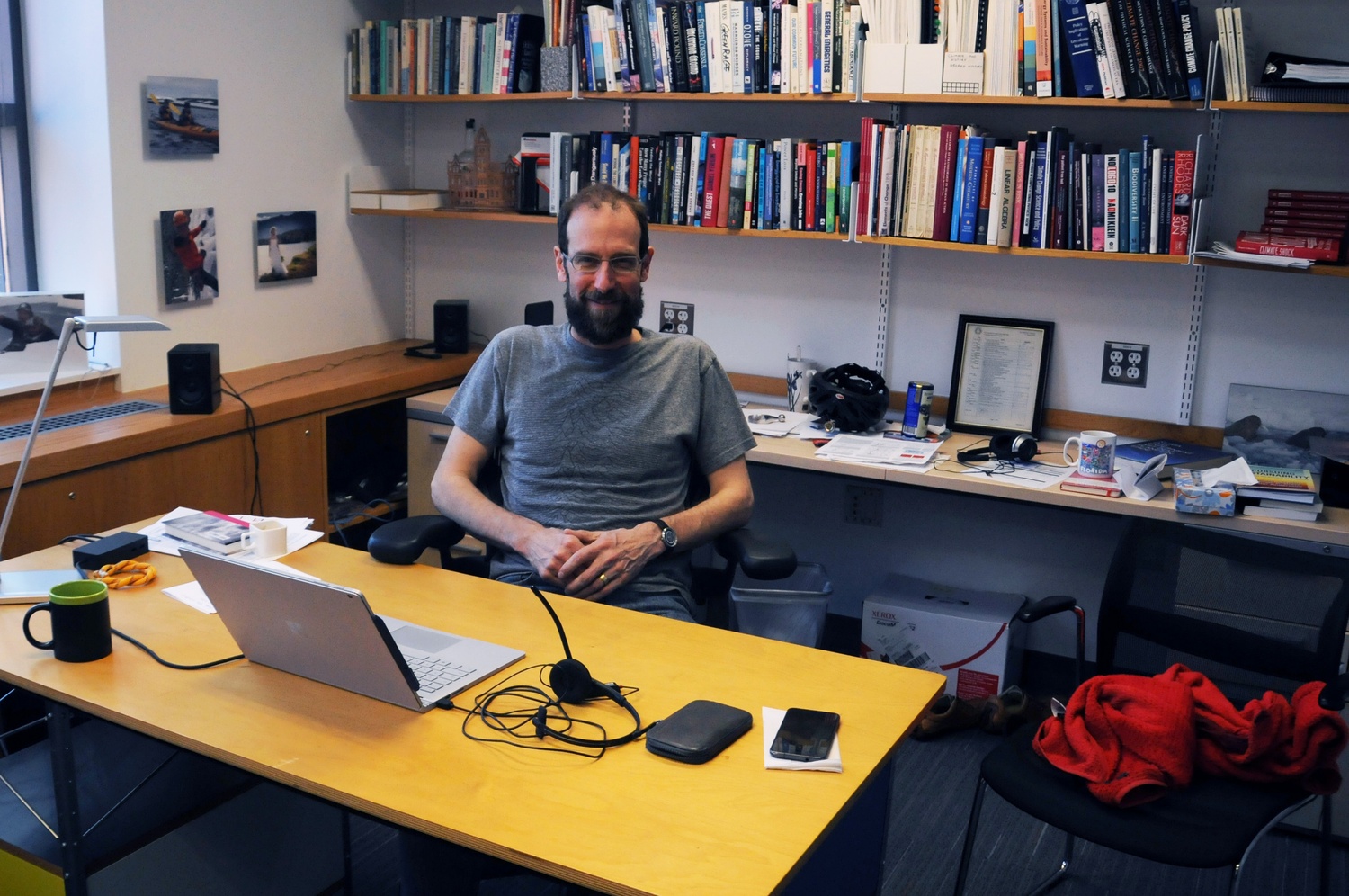 David Keith, a professor of Applied Physics in SEAS, poses for a portrait in his office at 12 Oxford Street.  Along with Environmental Sciences and Public Policy lecturer Gernot Wagner ‘02, Keith co-directs Harvard’s Solar Geoengineering Research Program.