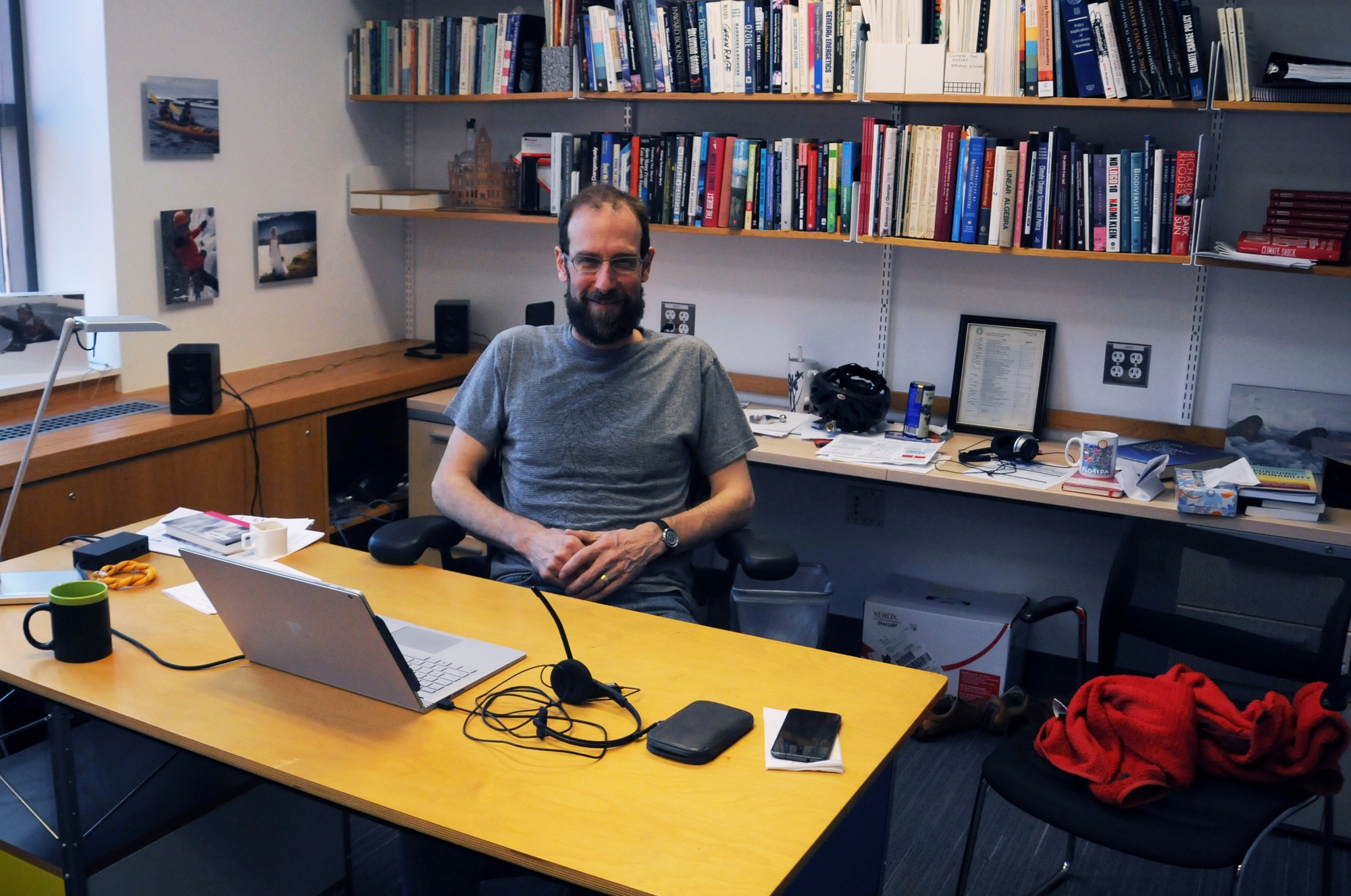 David Keith, a professor of Applied Physics in SEAS, poses for a portrait in his office at 12 Oxford Street.  Along with Environmental Sciences and Public Policy lecturer Gernot Wagner ‘02, Keith co-directs Harvard’s Solar Geoengineering Research Program.