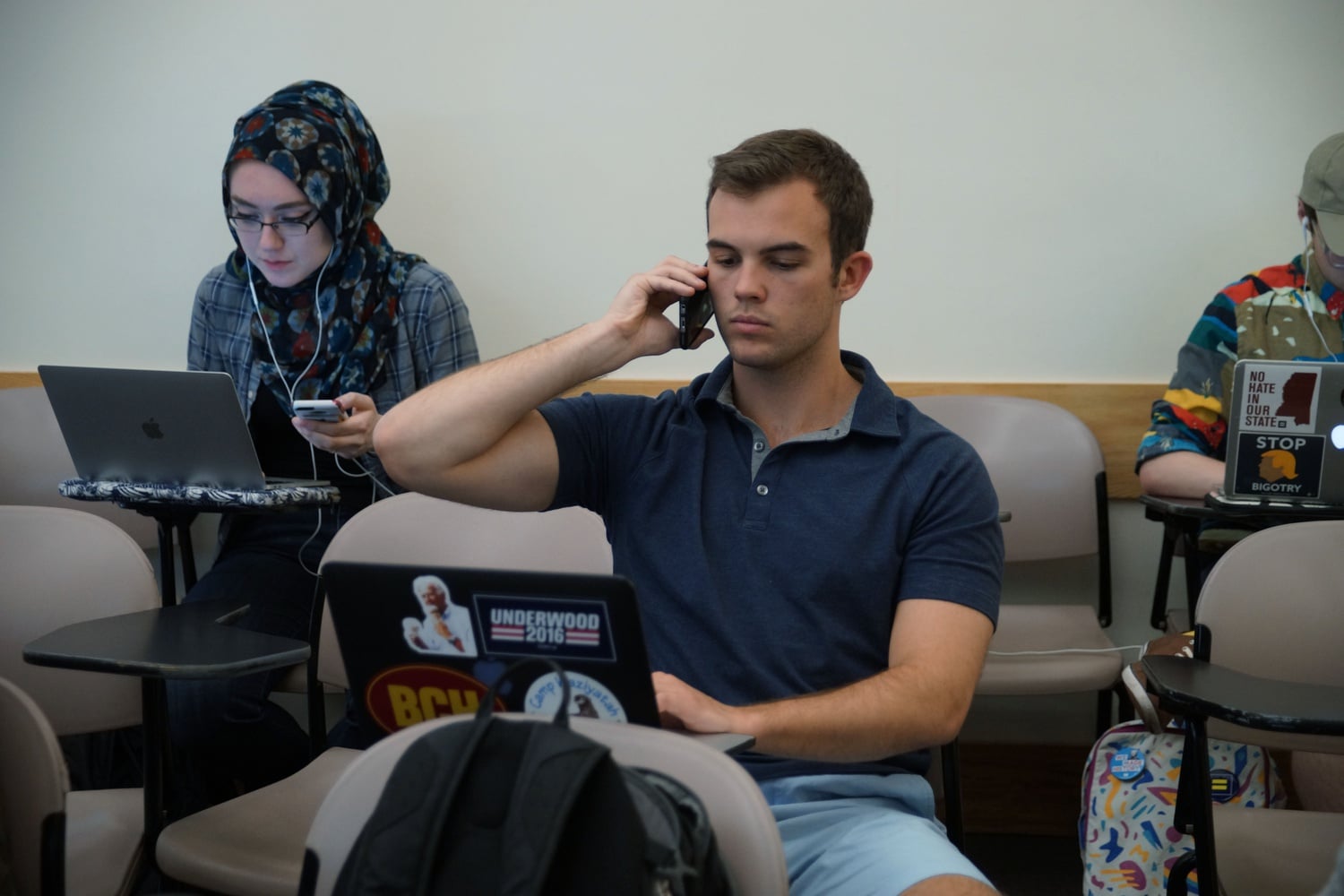 William T. Gildea ‘19, vice president of the Harvard Dems, speaks to potential voters at a phonebank for Jon Ossoff, a Democratic congressional candidate for Georgia's sixth district.  
