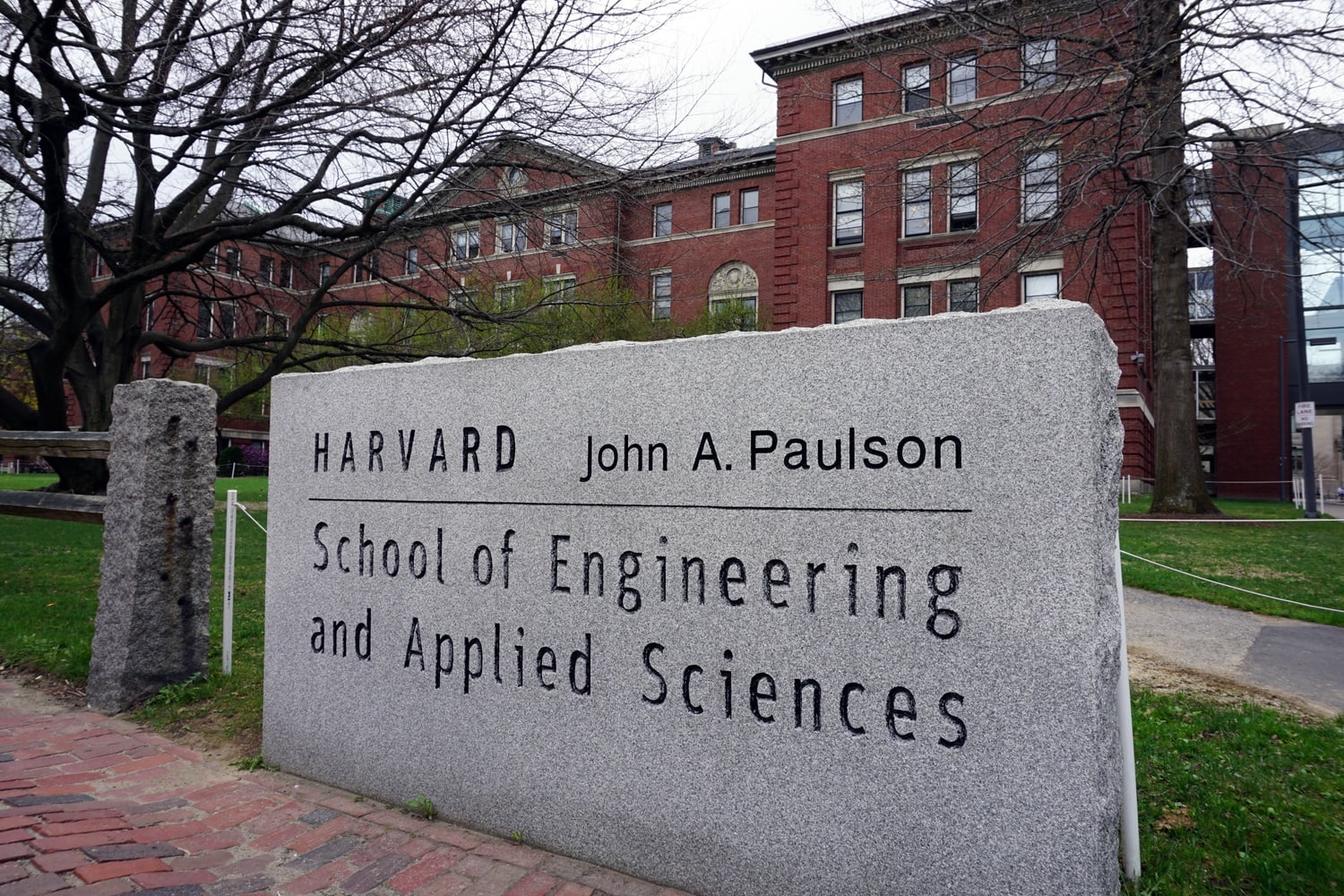 The John A. Paulson School of Engineering and Applied Sciences sign stands in front of Pierce Hall. 