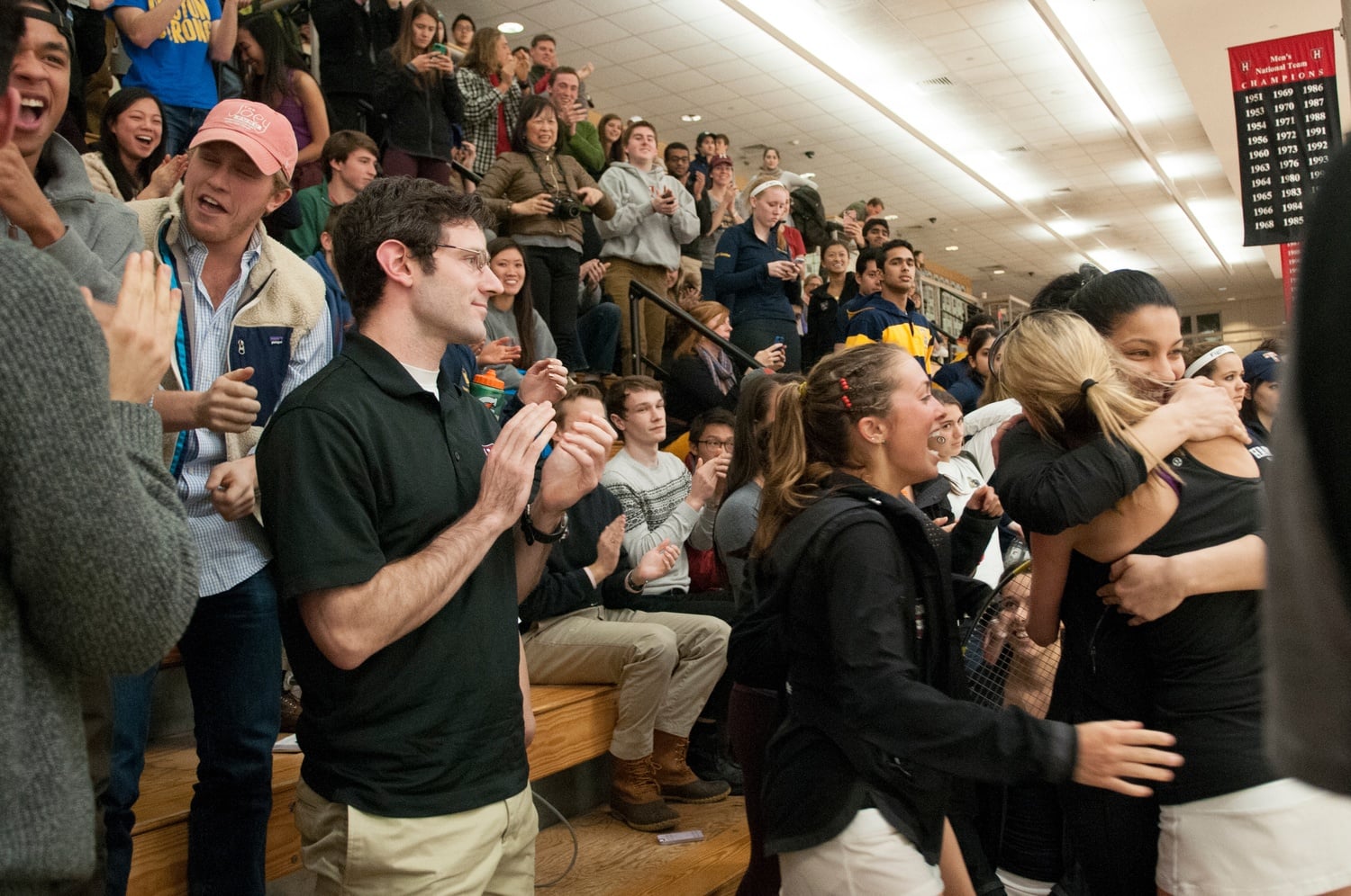 Women's squash players and fans celebrate after the team captured the 2015 CSA Women's National Team Championship.