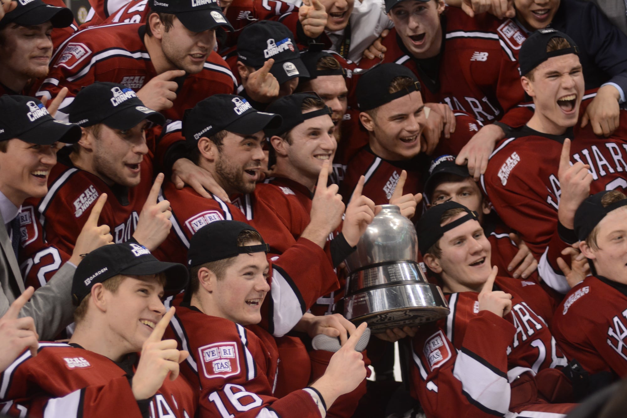After topping Boston University, the Crimson hoists the Beanpot trophy for the first time since 1993.