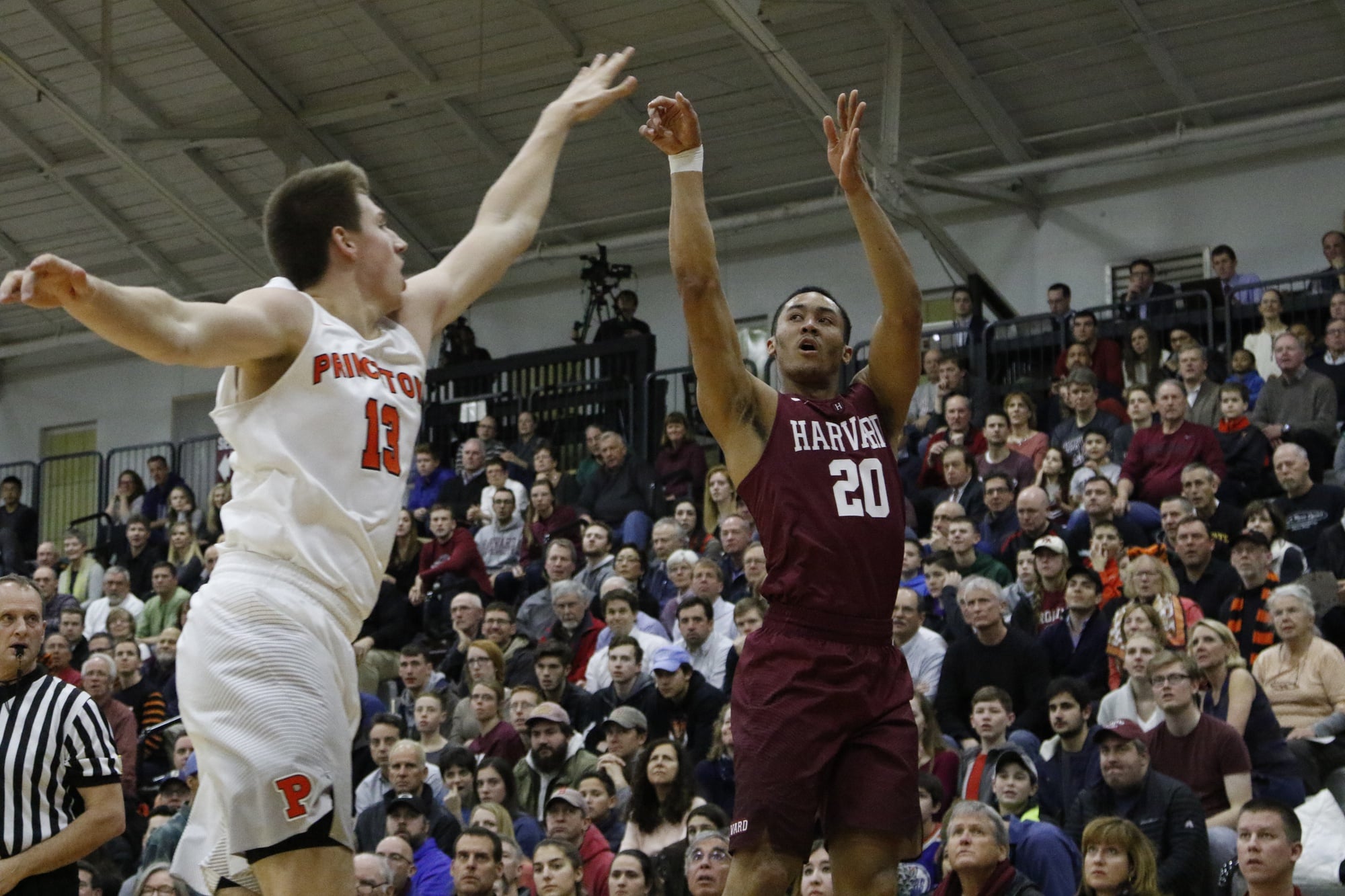 Freshman wing Justin Bassey takes a corner three against Princeton in February.