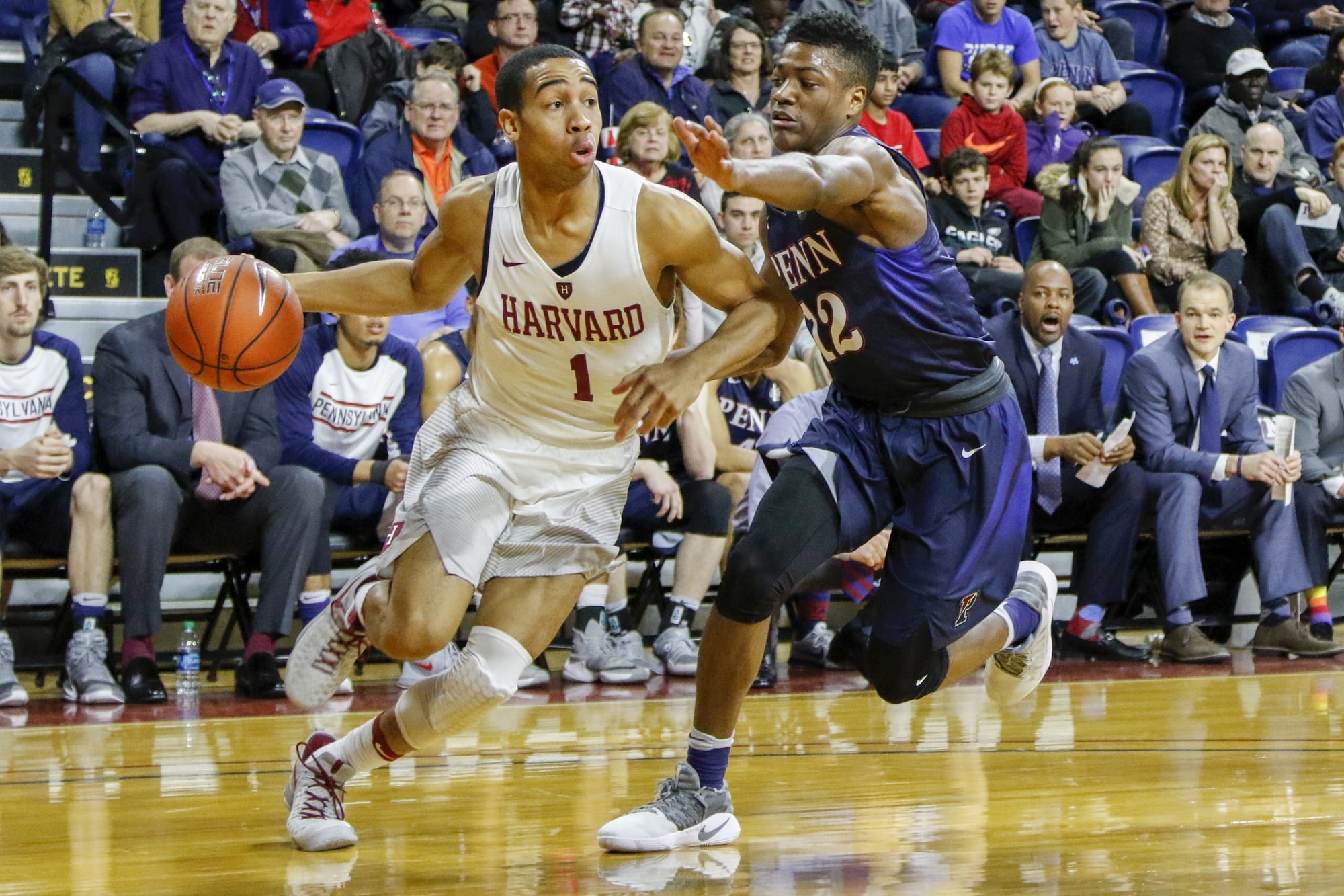 Co-captain Siyani Chambers drives to the hoop against Penn during his senior season.