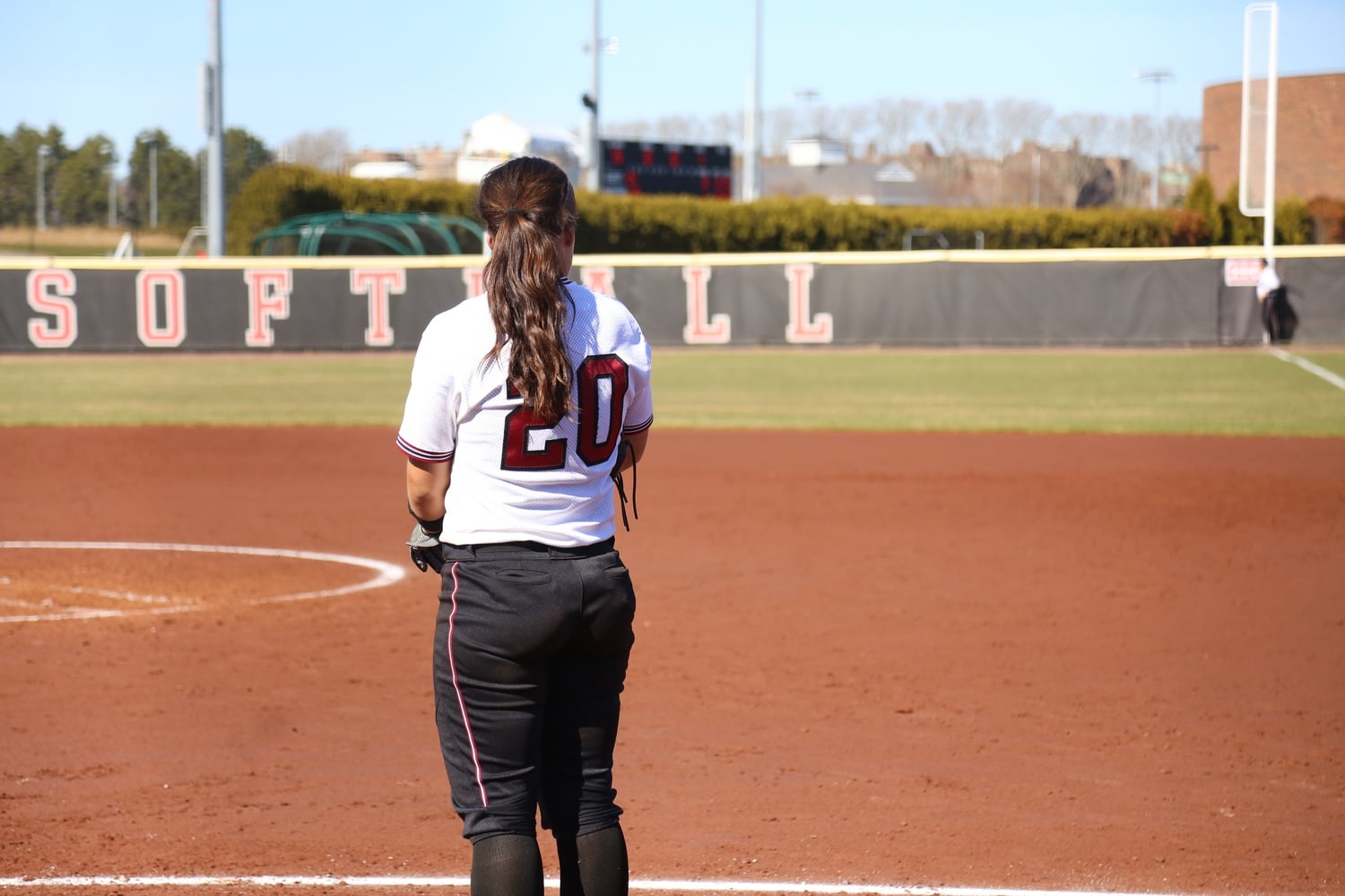 Sophomore third baseman Erin Lockhart prepares to head onto the field.