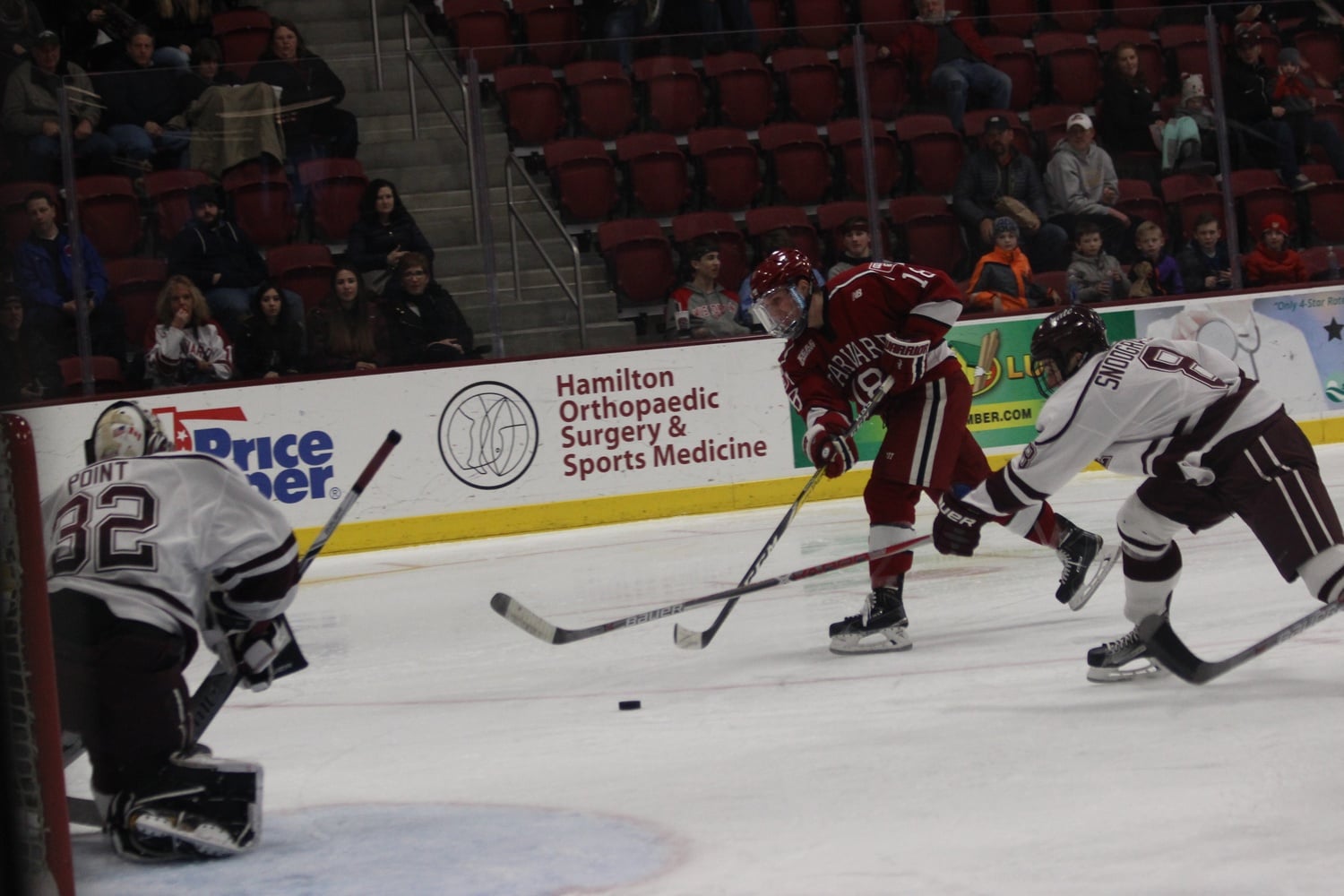 Freshman defenseman Adam Fox fires a shot at home versus Colgate.