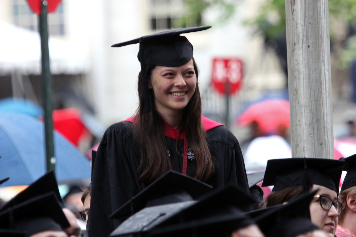 Katherine Y. Chen '17 stands during the Morning Exercises.  Chen, a resident of Quincy House, received both an A.B. in Computer Science and an A.M. in Statistics on Thursday.
