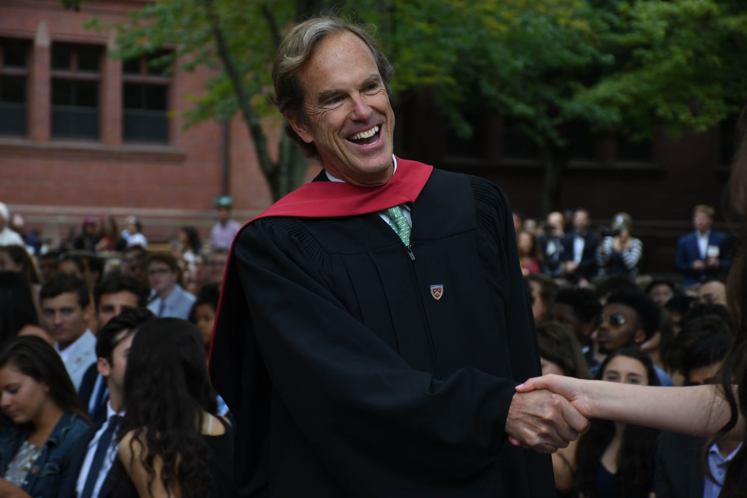Dean of Freshmen Thomas A. Dingman '67, pictured at Commencement in 2017, will step down at the end of the academic year.