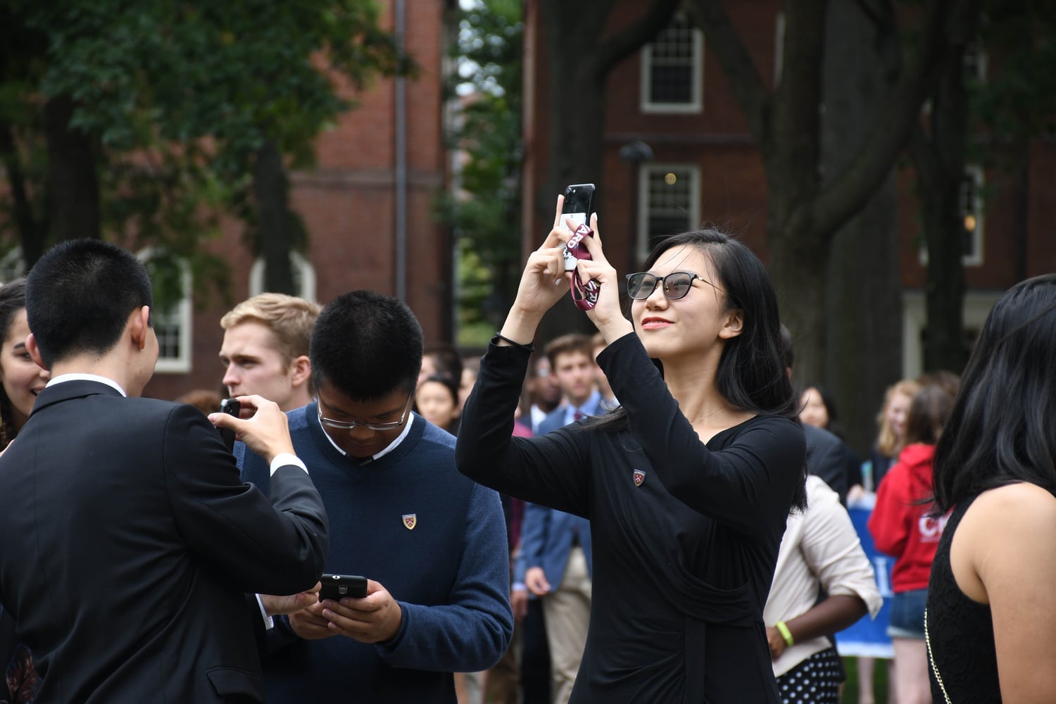 Jingyao (Lux) Zhao '21, a resident of Stoughton Hall, pauses for a photo during the procession towards Convocation