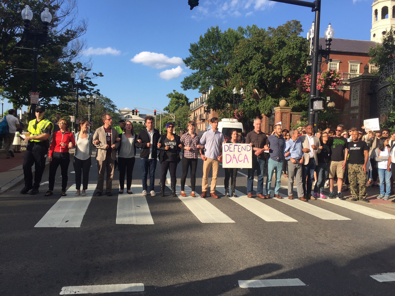 Police arrested professors who blocked traffic along Massachusetts Ave.