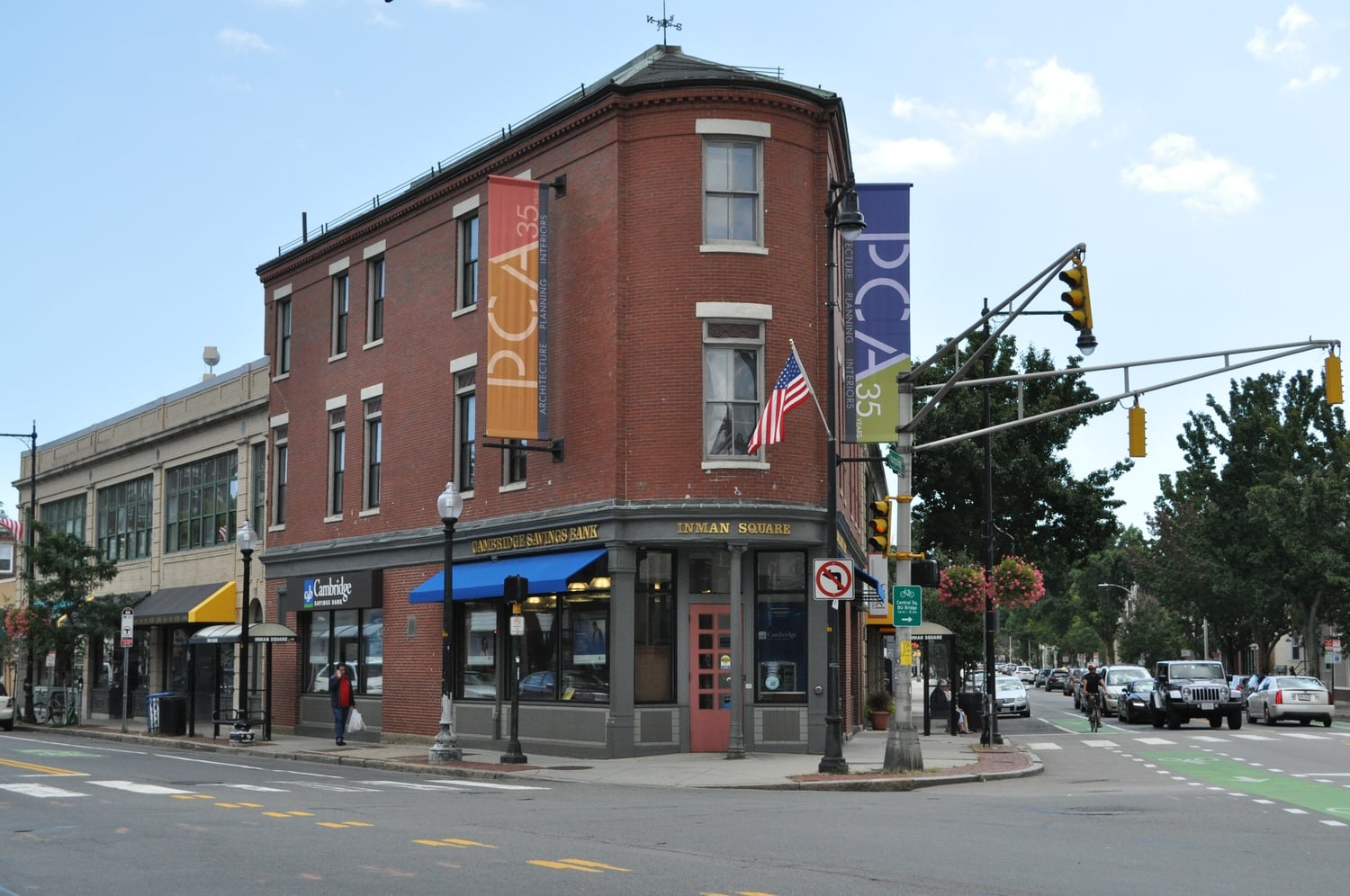 Cambridge Savings Bank lies at the center of Inman Square. Tim Devin led a counterculture walking tour of the area based on his recent book.