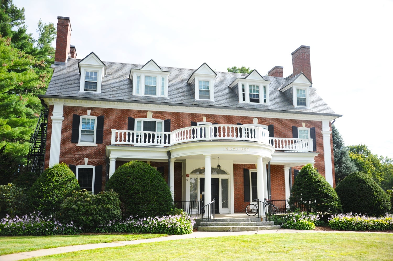 Newport House, formerly known as Phi Delta Sigma. After Amherst College banned in fraternities in 1984, the college purchased most of the former fraternity houses and converted them to residential houses.