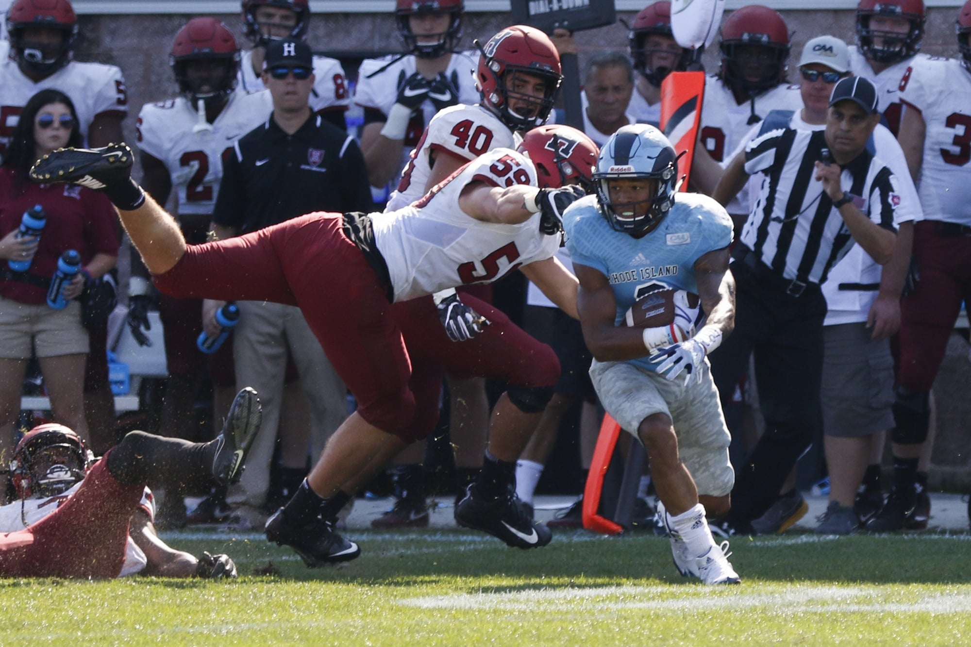 Sophomore linebacker Joey Goodman dives for the tackle on Saturday against Rhode Island, but ends up empty-handed.