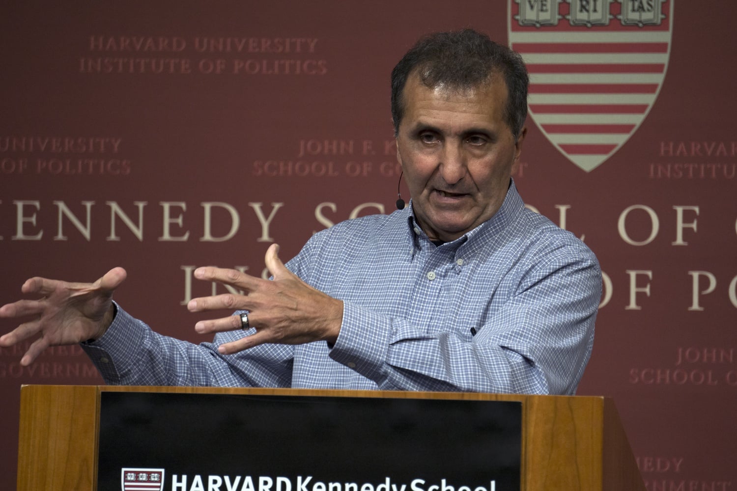 Pete Souza uses his photographs to reminisce the Obama years with audience members at the IOP Wednesday evening. Souza was the Chief Official White House Photographer for Presidents Ronald Reagan and Barack Obama.
