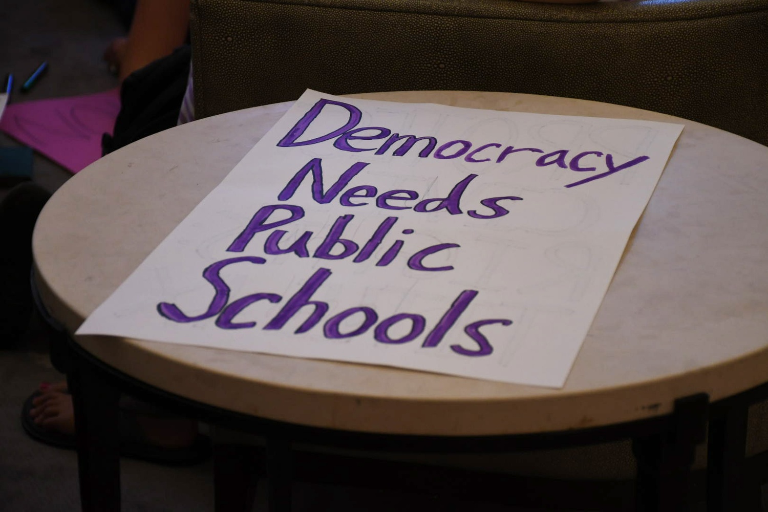 Students from “Our Harvard Can Do Better” gathered at Harvard Law School on Tuesday evening to make signs and banners protesting Education Secretary Betsy DeVos’ rolling-back of Obama-era Title IX guidelines. DeVos will speak at the Institute of Politics on Thursday.
