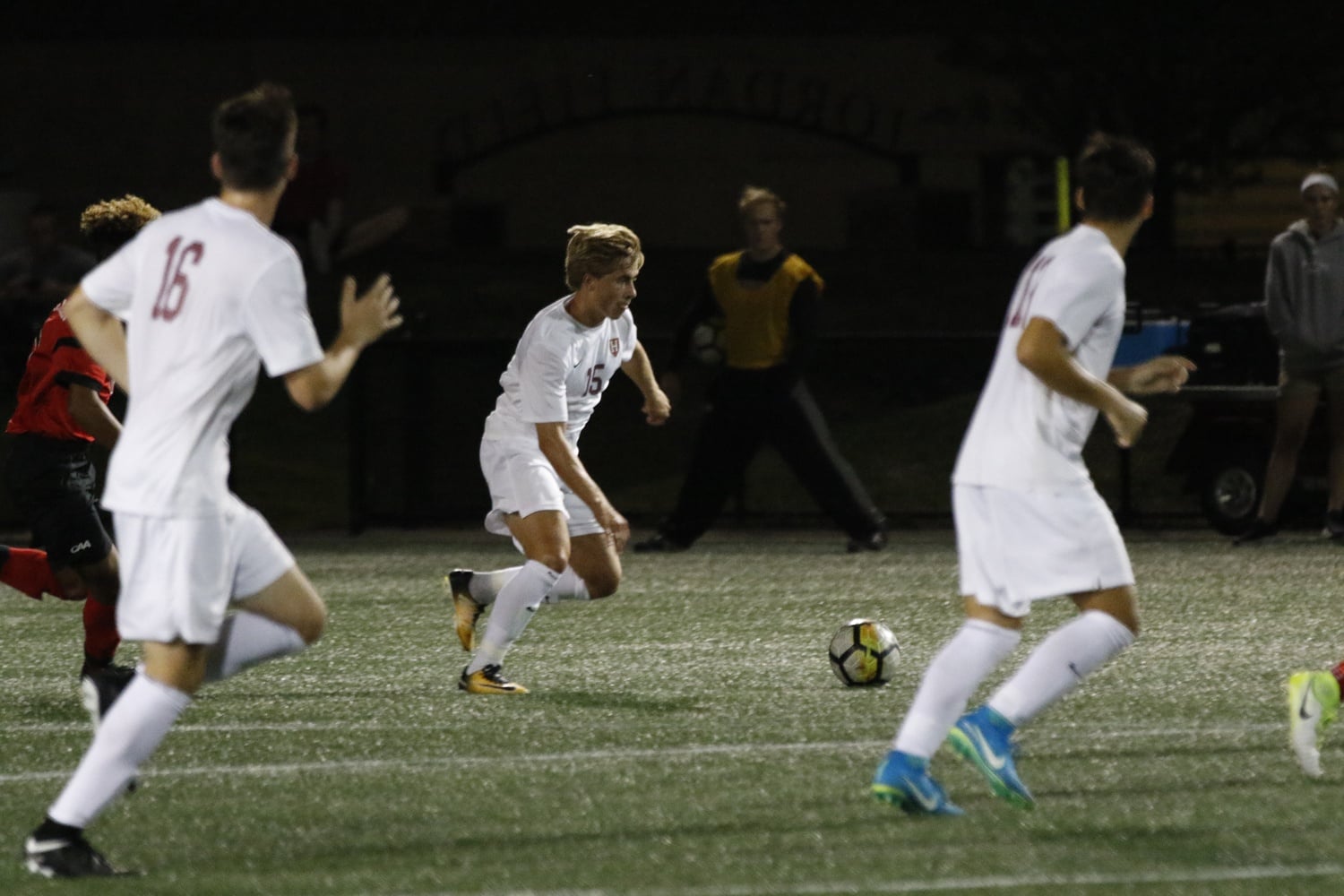 Freshman midfielder Cornelius Bencsik carries the offense forward in a transition toward the opposing goal. Harvard was forced to play mostly defense, quadrupling the number of saves made its opponent.