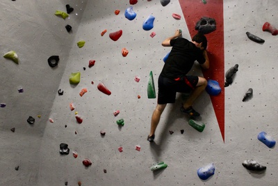 Cover image for Expanded Climbing Wall Reopens at QRAC
