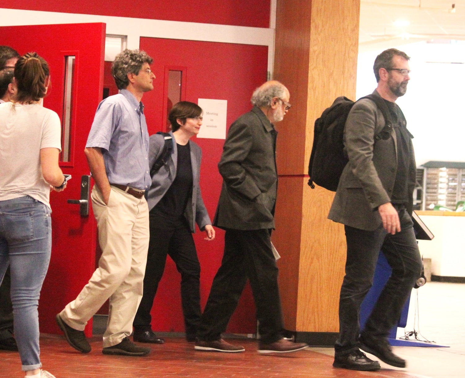 Faculty leave a meeting in the Science Center in October.