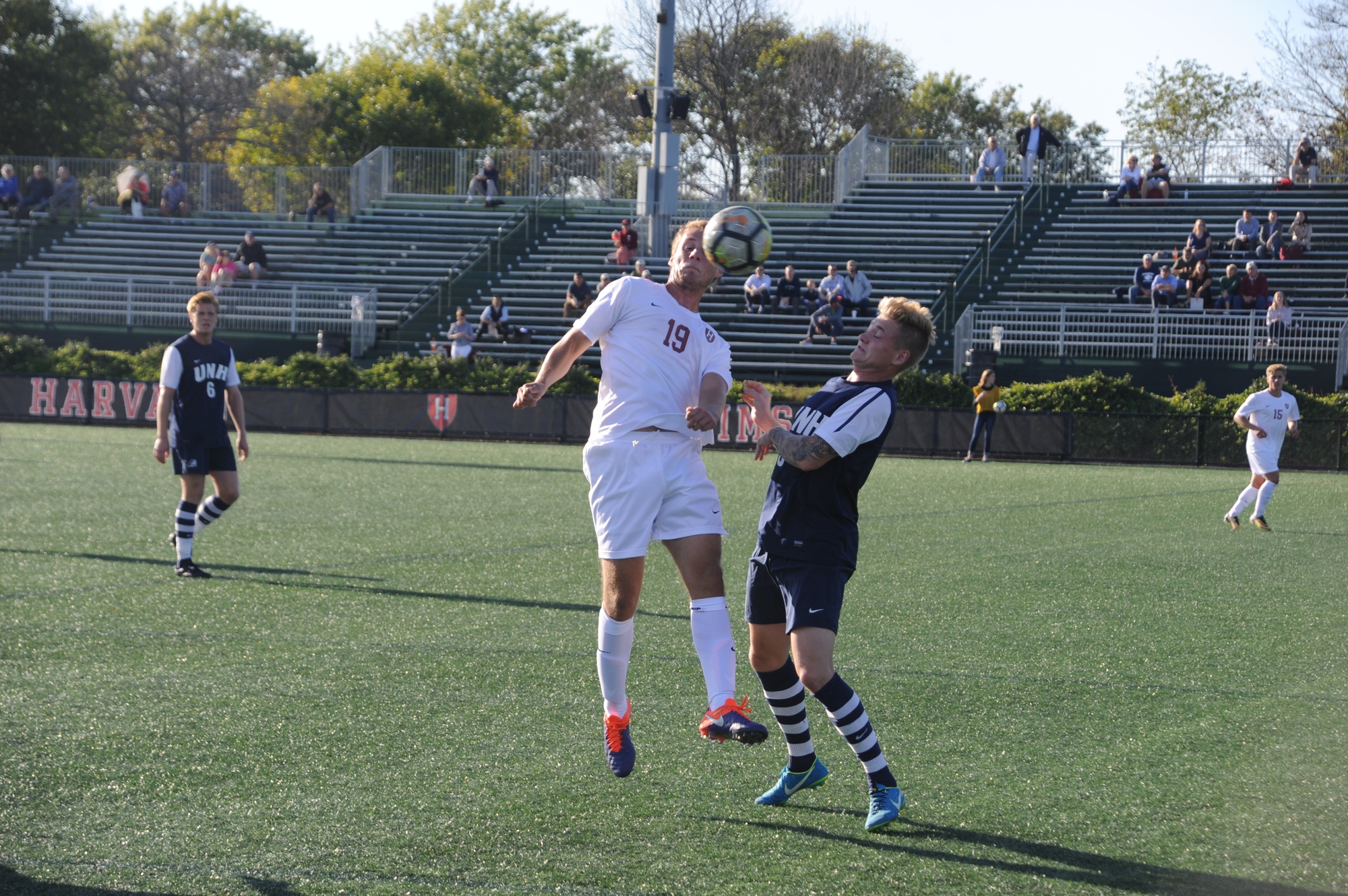 Freshman defender/forward Rory Conway leaps up to settle a 50/50 ball against an opponent from the University of New Hampshire. The rookie started for the third time this season, and recorded one of the Crimson’s shots on goal.