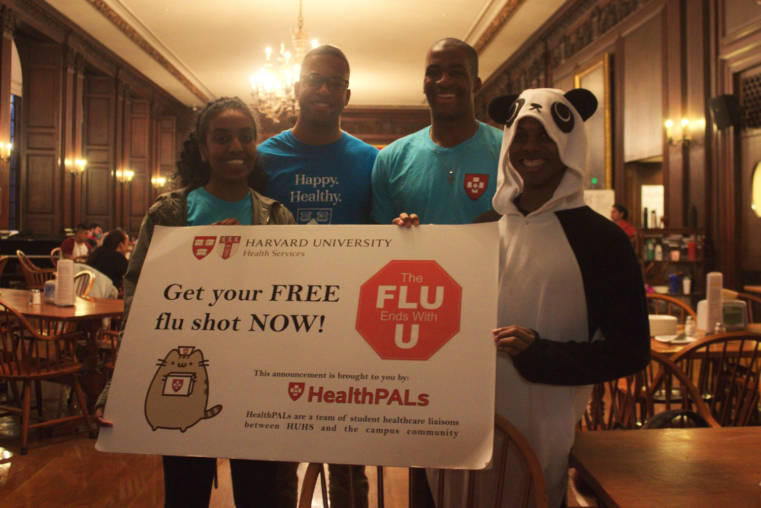 HealthPALs stand in Eliot House’s dining hall during dinner hours to offer students the flu vaccine.