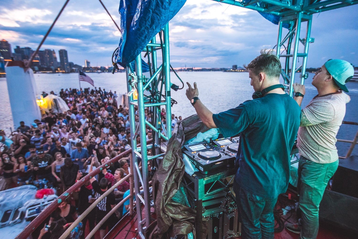 Timothy D. Haehl '18 DJs at a gig this past summer for his Boat Cruise Summer Series.