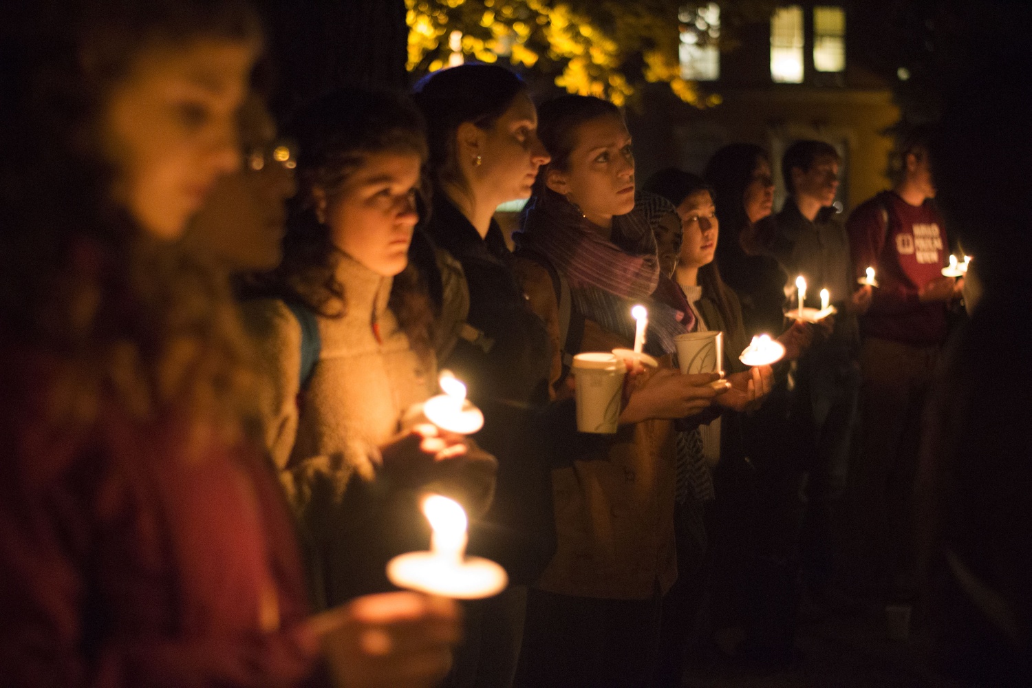 Students and university affiliates rally against the Muslim Ban in Tercentenary Theatre Tuesday night.