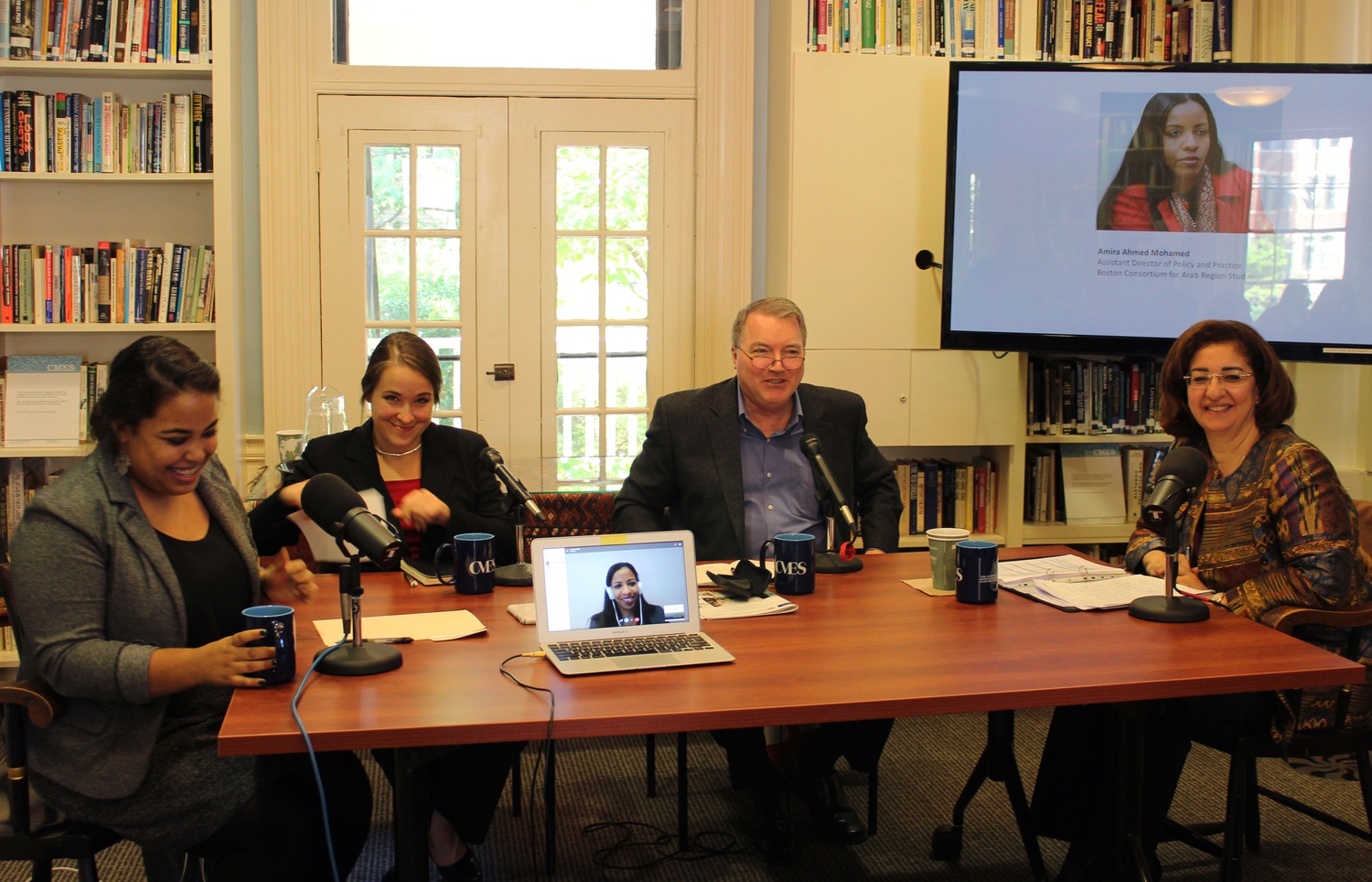 Meredith Blake moderates a panel consisting of Kate Akkaya, JD, Dr. Denis Sullivan, and H.E. Reem Abu Hassan while Dr. Amira Ahmed Mohamed contributes via Skype at a live recording of a Humanitarian Assistance Podcast episode concerning the Syrian refugee crisis at the Center for Middle Eastern Studies on Wednesday.
