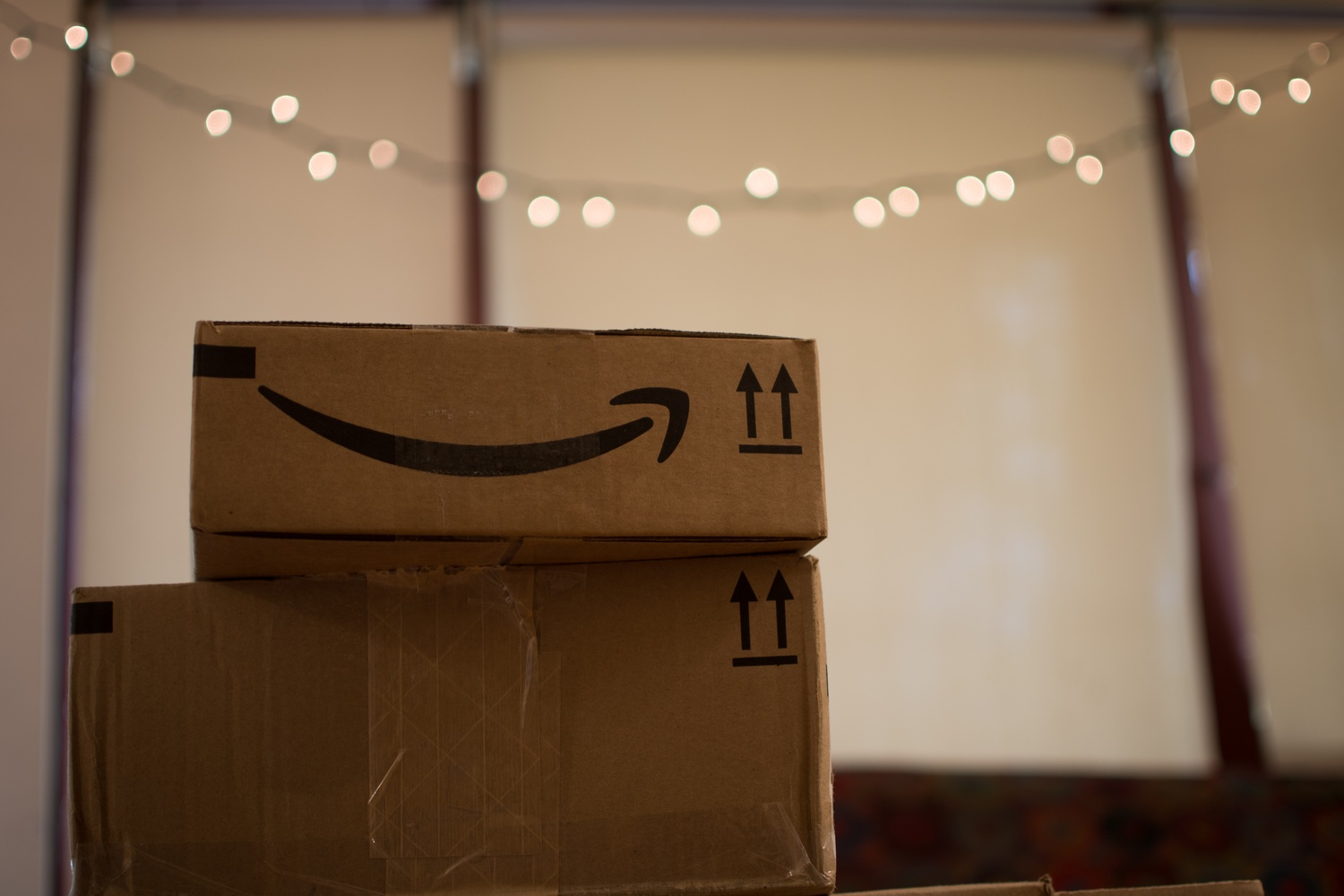 Amazon.com packages - a common sight in building managers' offices and mail centers on campus - are easily recognizable by the company's familiar "smile" logo.  University President Drew G. Faust wrote in a letter to Amazon CEO Jeff Bezos that she hopes the technology and retail giant will choose Boston as the home of its second headquarters.