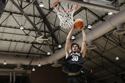 Cover image for Canadian Players Boost Men's Basketball