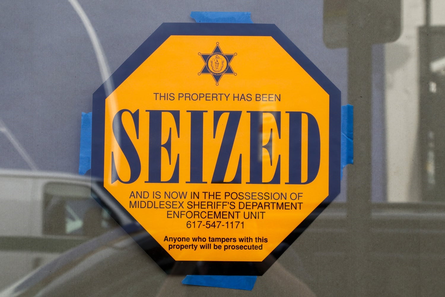 Signs notifying the public of Market in the Square's seizure were posted on the premises' windows early Thursday.
