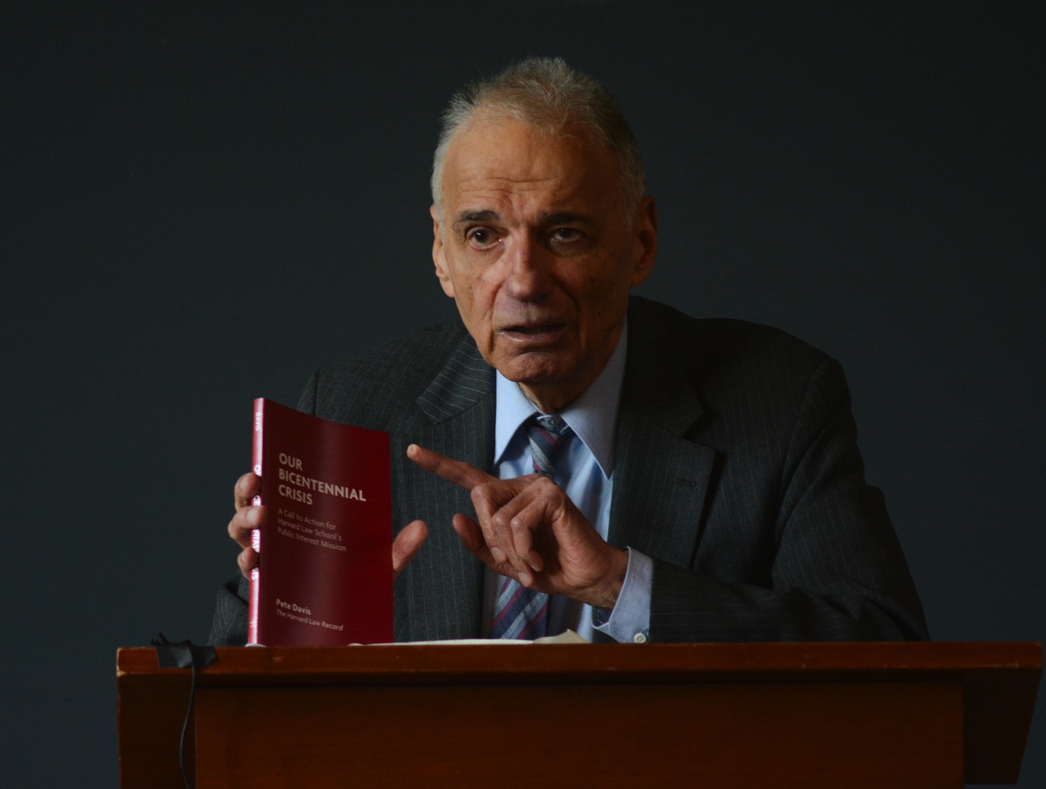 Repeat presidential candidate Ralph Nader discusses “Our Bicentennial Crisis,” a recent publication by Law student Pete Davis. Nader was critical of the school’s practices during his talk in Langdell Hall in November. 