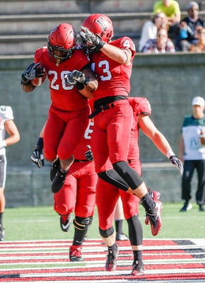 Cover image for Football Players Work to 'Conquer Adversity'