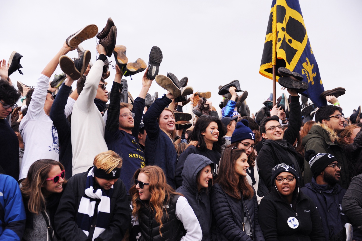During the third quarter of the Game, residents of Yale's Saybrook College hold their shoes in the air as a warning that they are about to take off their clothes.