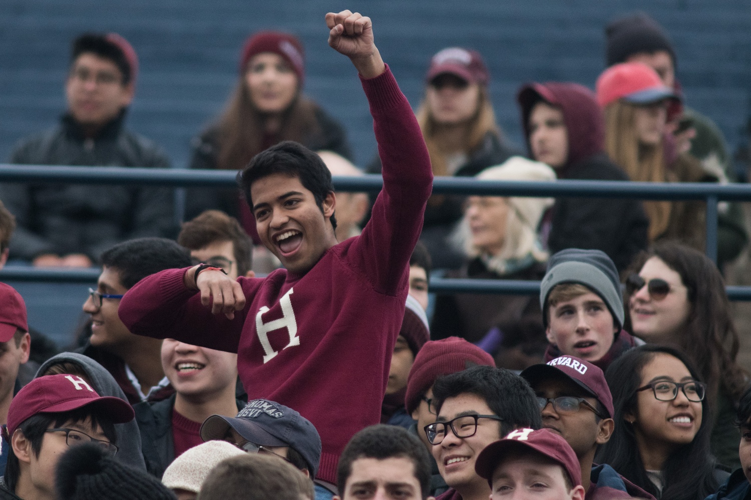 Ajay V. Singh '21 cheers enthusiastically for Harvard early on during the Game.