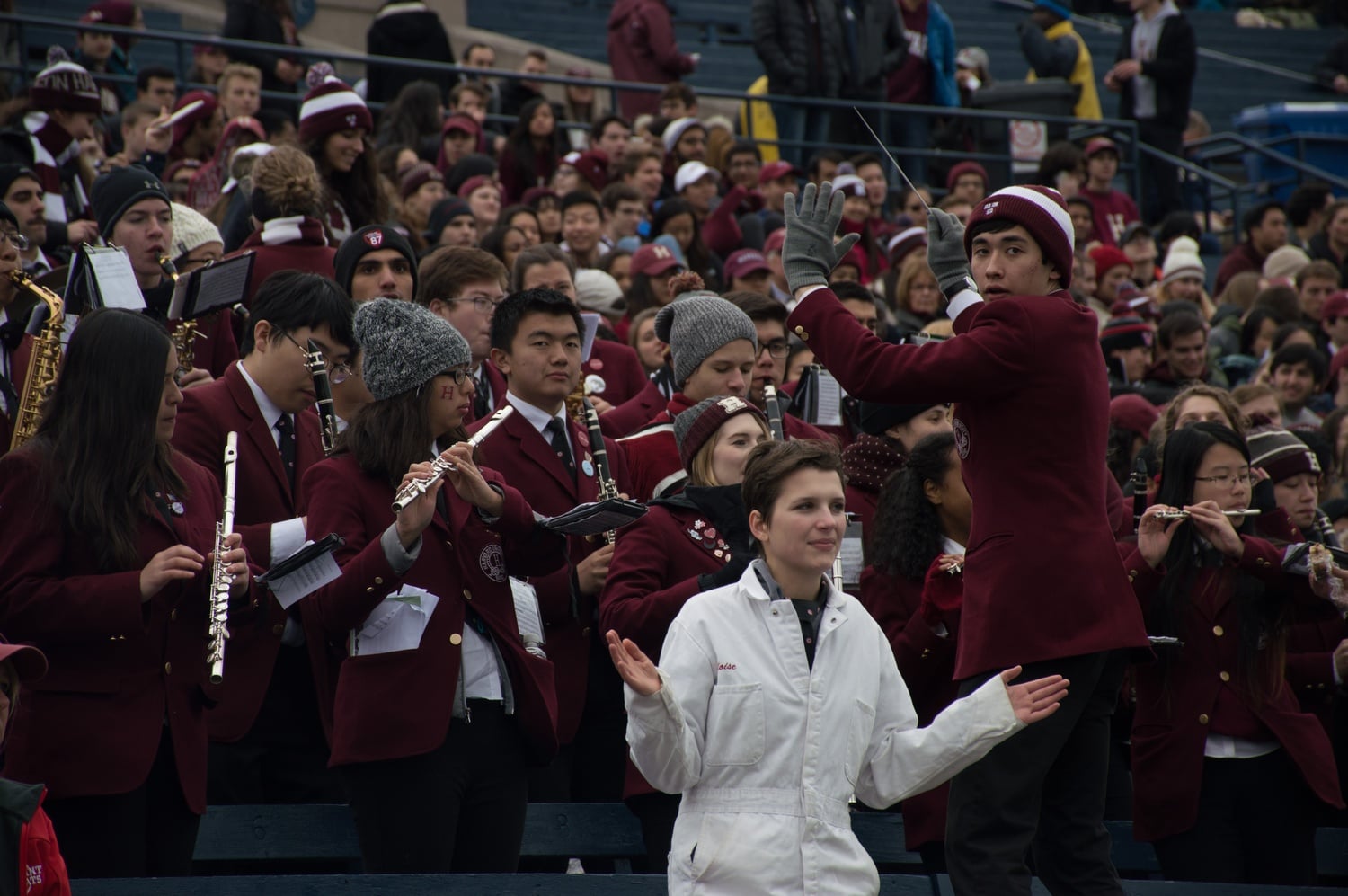 Nathan P. Wolfe '19 conducts the Harvard University Band during the Game.