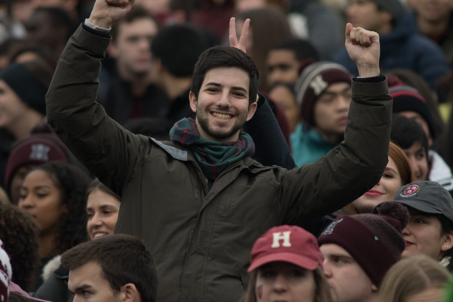 Adam S. Hirschhorn '20 cheers despite the light rain.