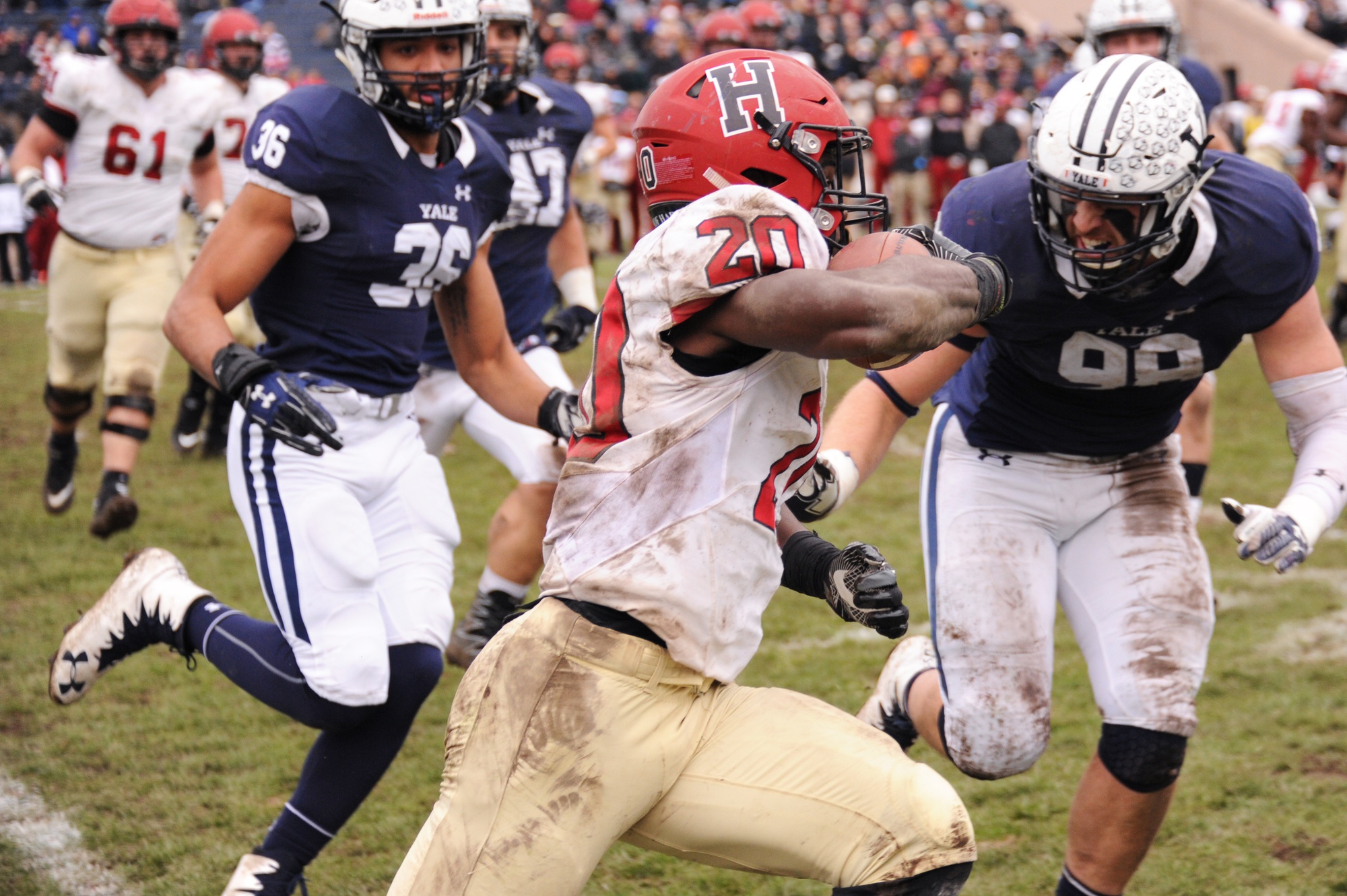 Freshman running back Aaron Shampklin rushes against Yale’s defense on Saturday. On a couple other occasions, pitches to the Crimson’s running backs led to fumbles recovered by Yale. These plays were symptomatic of the entire weekend as Harvard’s offense never got going and Yale went on to win 24-3.