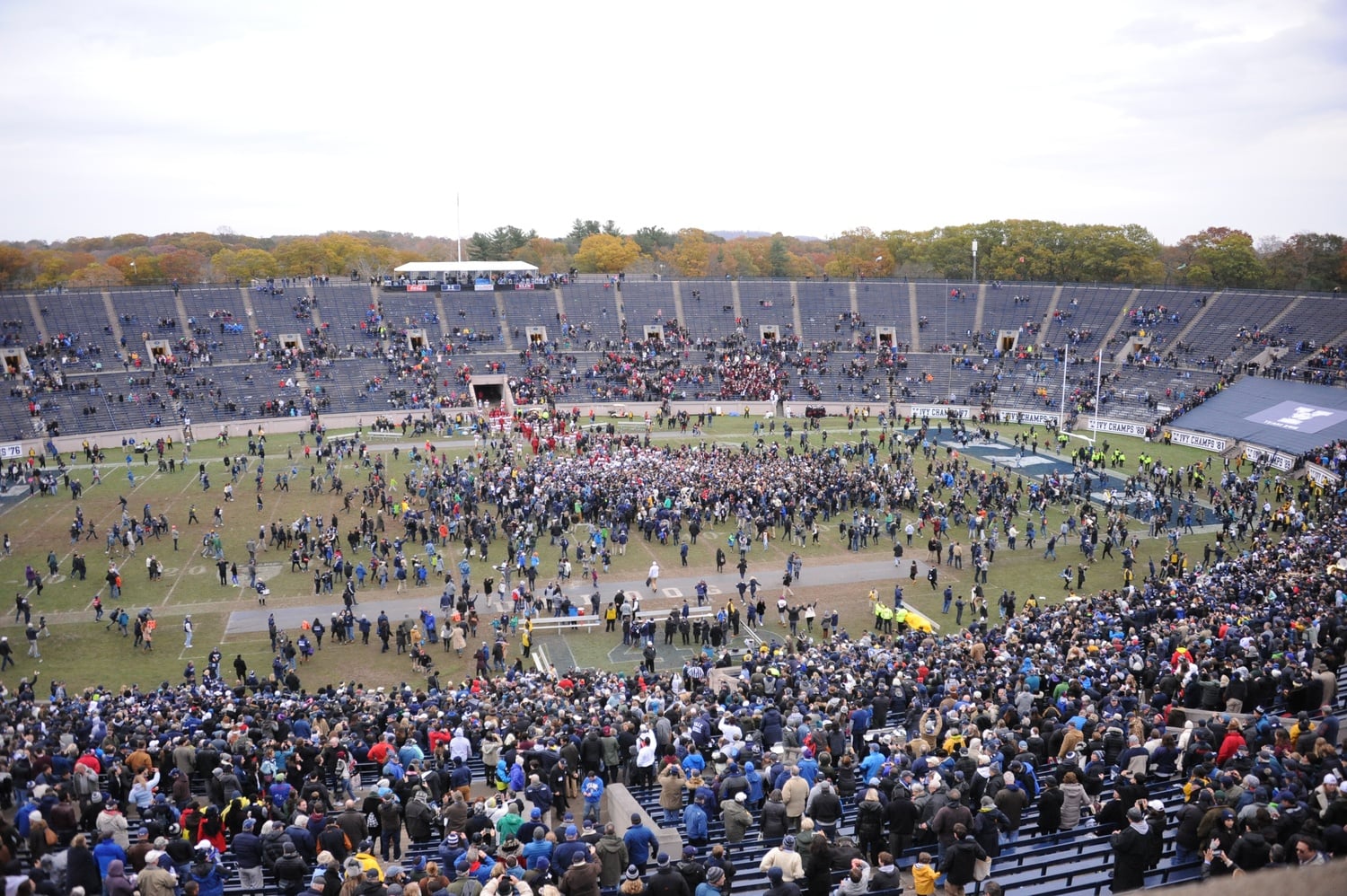 After the final whistle confirmed Yale's first outright Ivy League championship win in almost four decades, Yalies stormed the field in celebration.