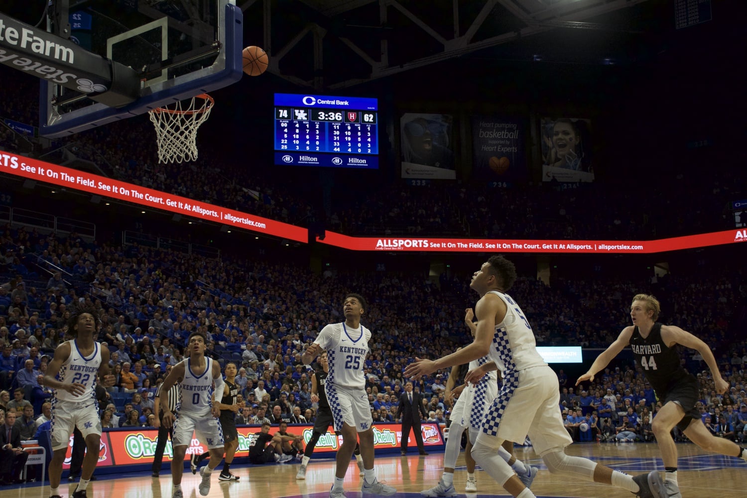 As sophomore center Henry Welsh rushes in, the Kentucky defense prepares to grab a rebound.