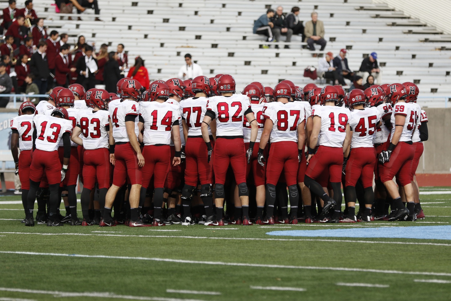 The Crimson huddles up at Columbia earlier this season.