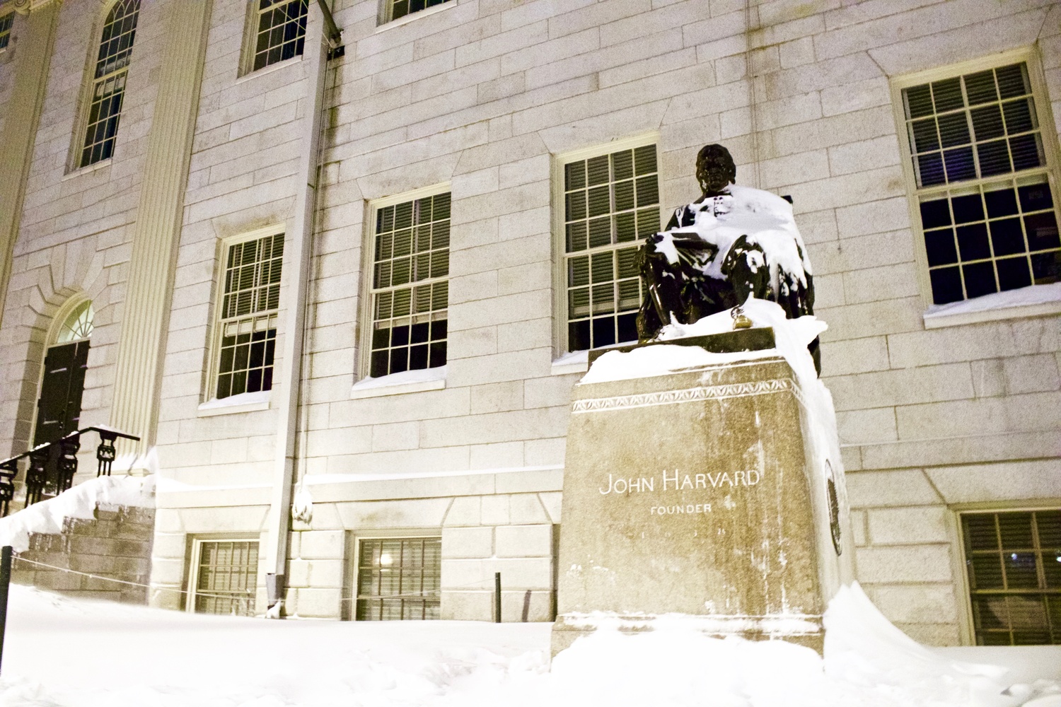 The statue of John Harvard sits, covered by snow, during the 'bomb cyclone' on Jan. 4.