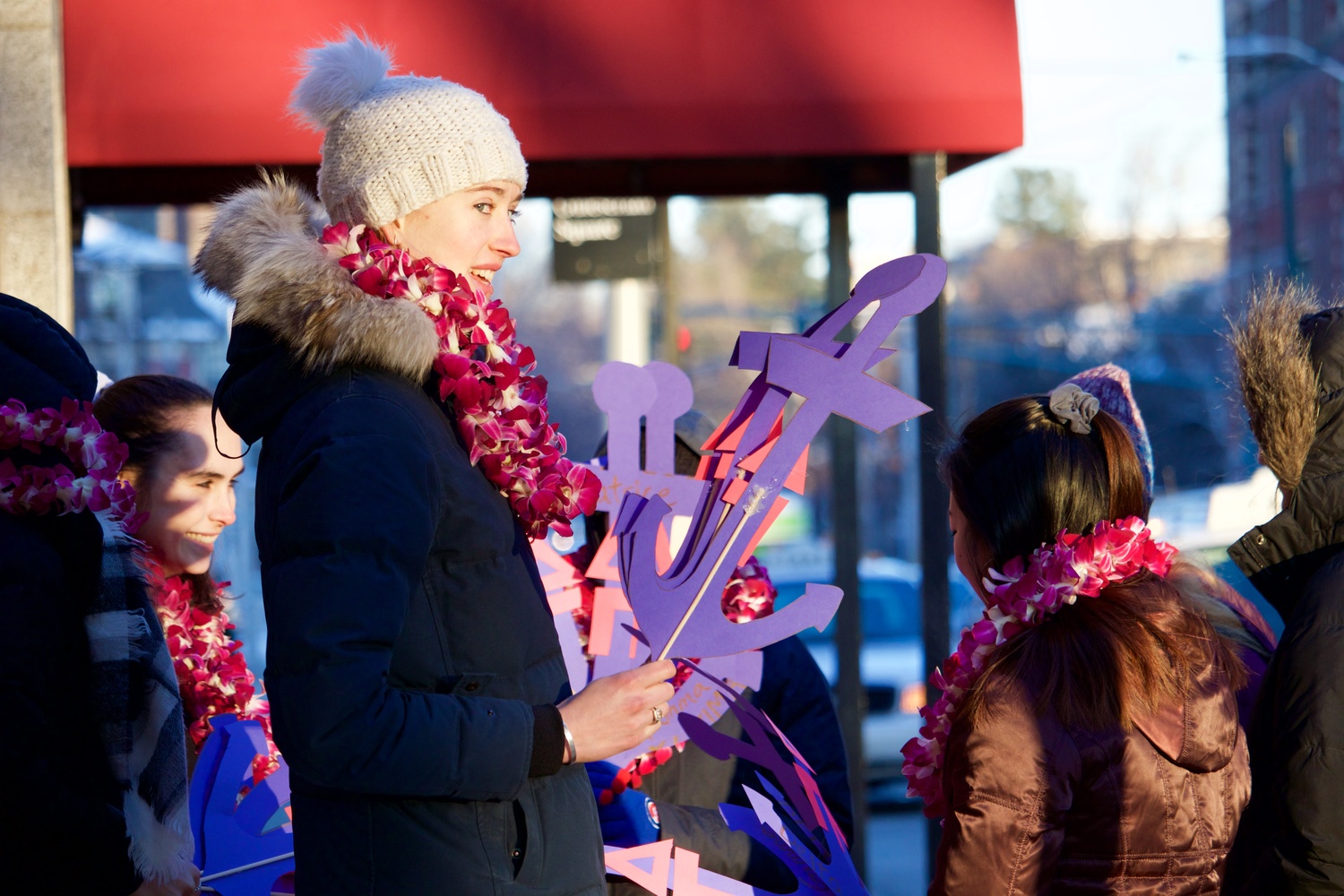 Caroline E. Diggins '20 waits outside the Sheraton Commander Wednesday morning to greet new Delta Gamma sisters.