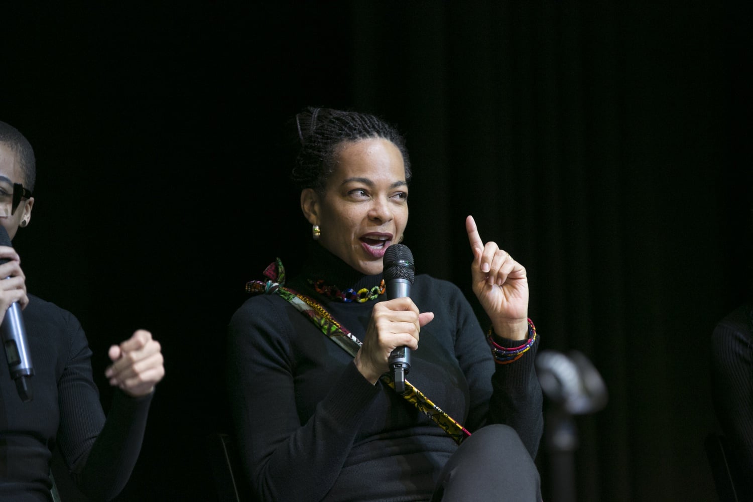 Director Ifeoma Fafunwa speaking on a panel at Hibernian Hall.
