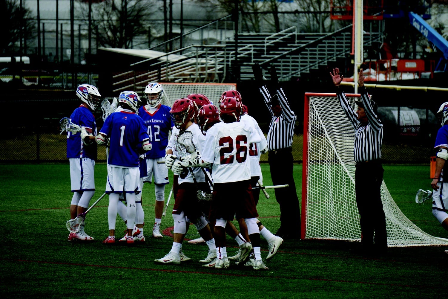 The team celebrates after netting a goal against UMass Lowell. 