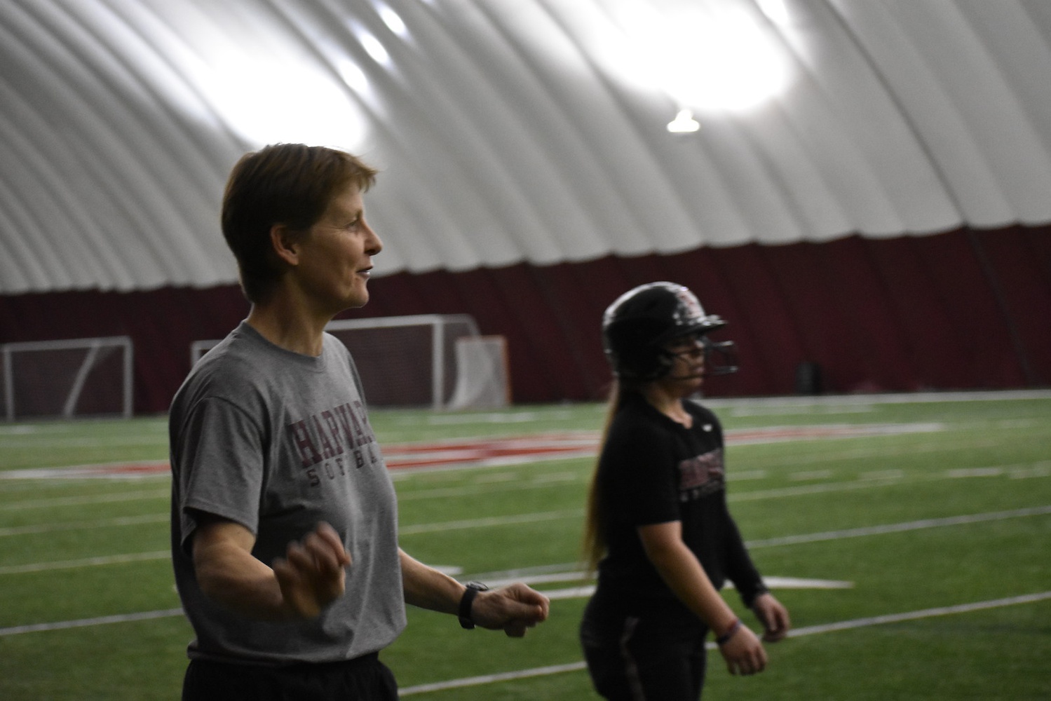 Coach Allard looks on as the team prepares for the season. 