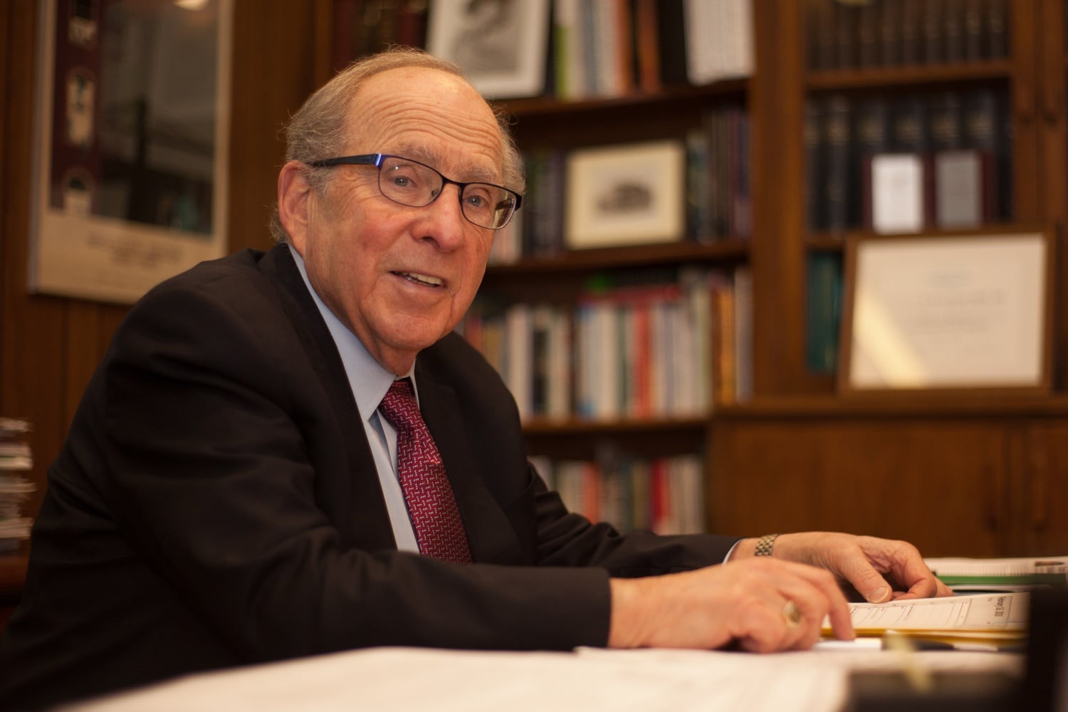 Dean Bruce Donoff of the Harvard Dental School poses for a photograph in his Longwood Medical Area office.
