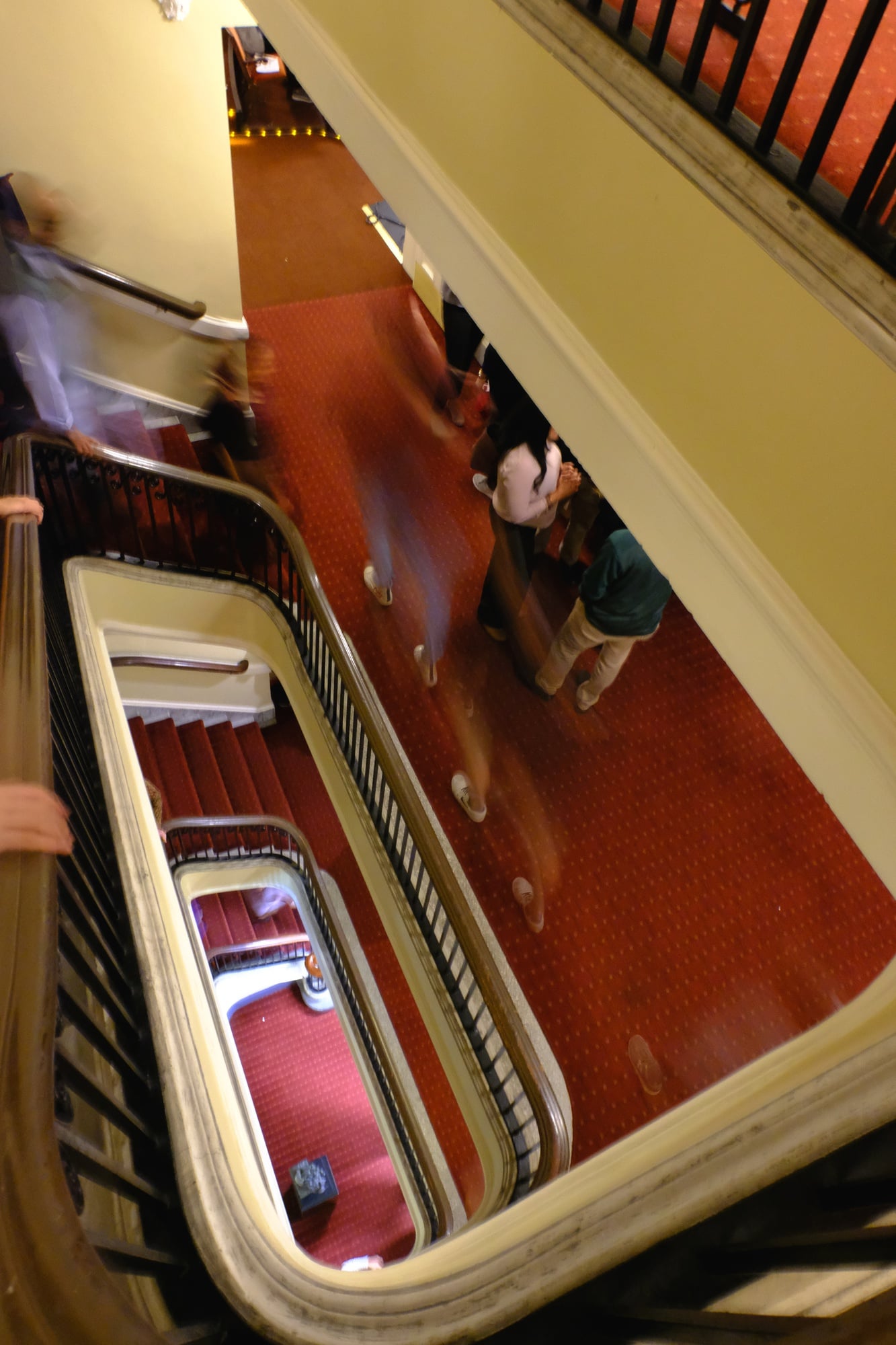 People mill about in the stairwell outside of Aggasiz theater, where Ghungroo was held