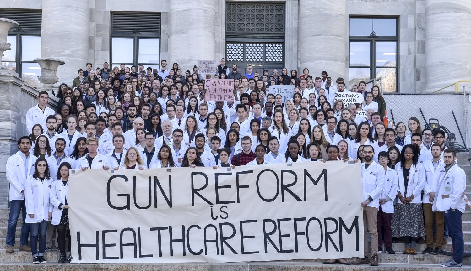 Longwood students pose for a photo to protest gun violence. 