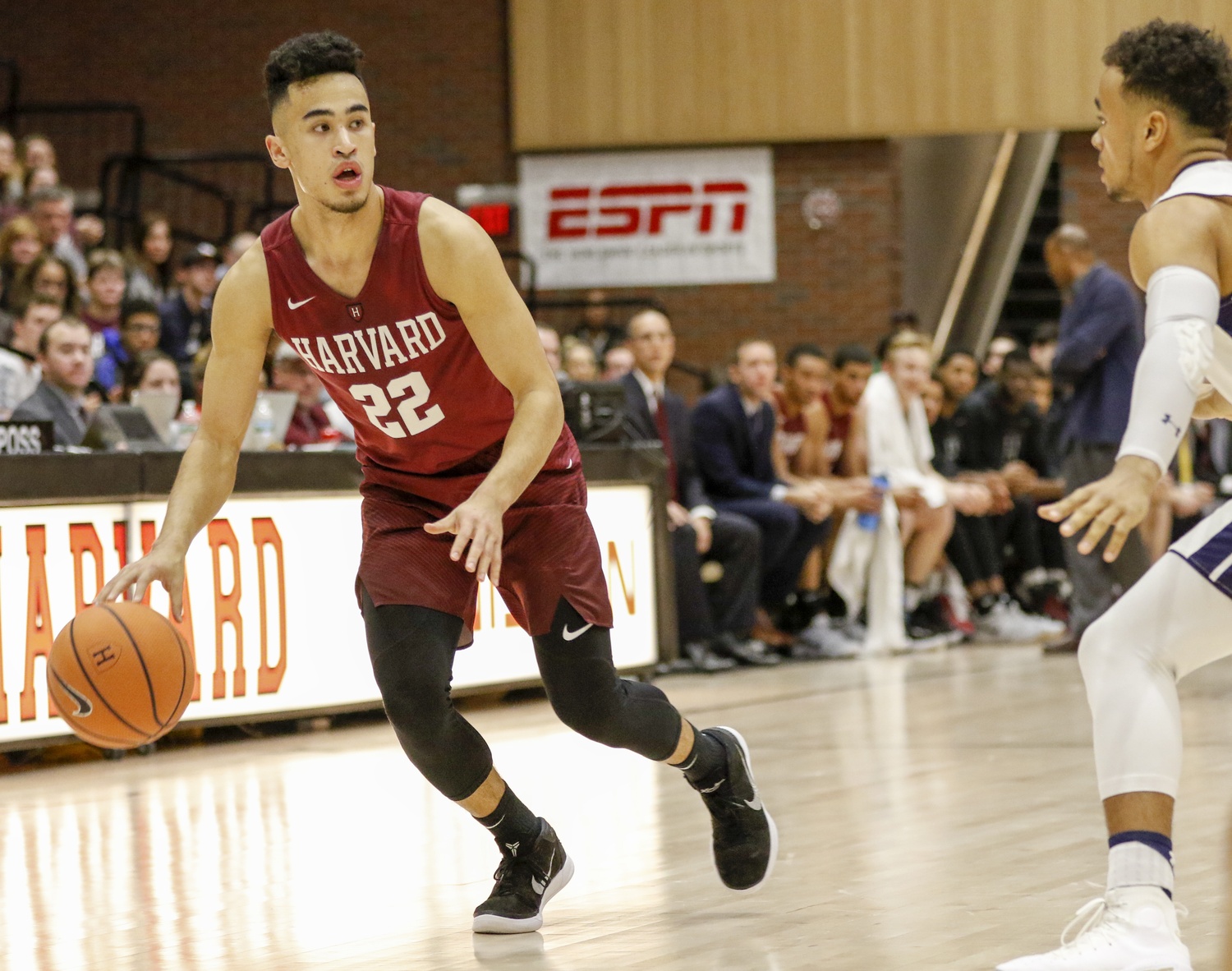 Sophomore guard Christian Juzang looks across court during the Feb.17 Yale victory. 