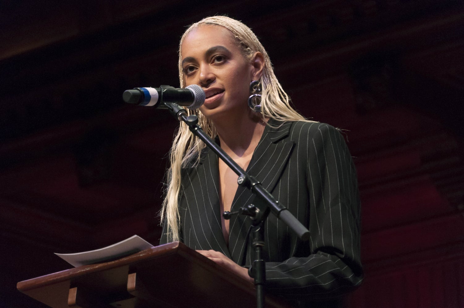 Solange Knowles accepts the Harvard Foundation's artist of the year award.